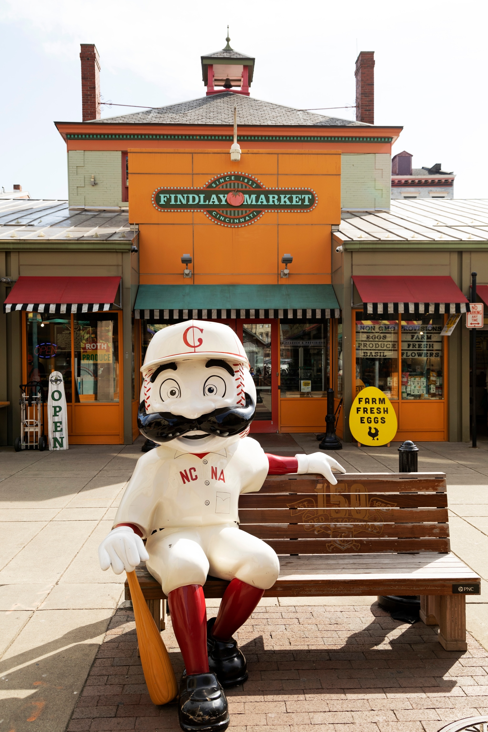 baseball mascot in front of Findlay Market