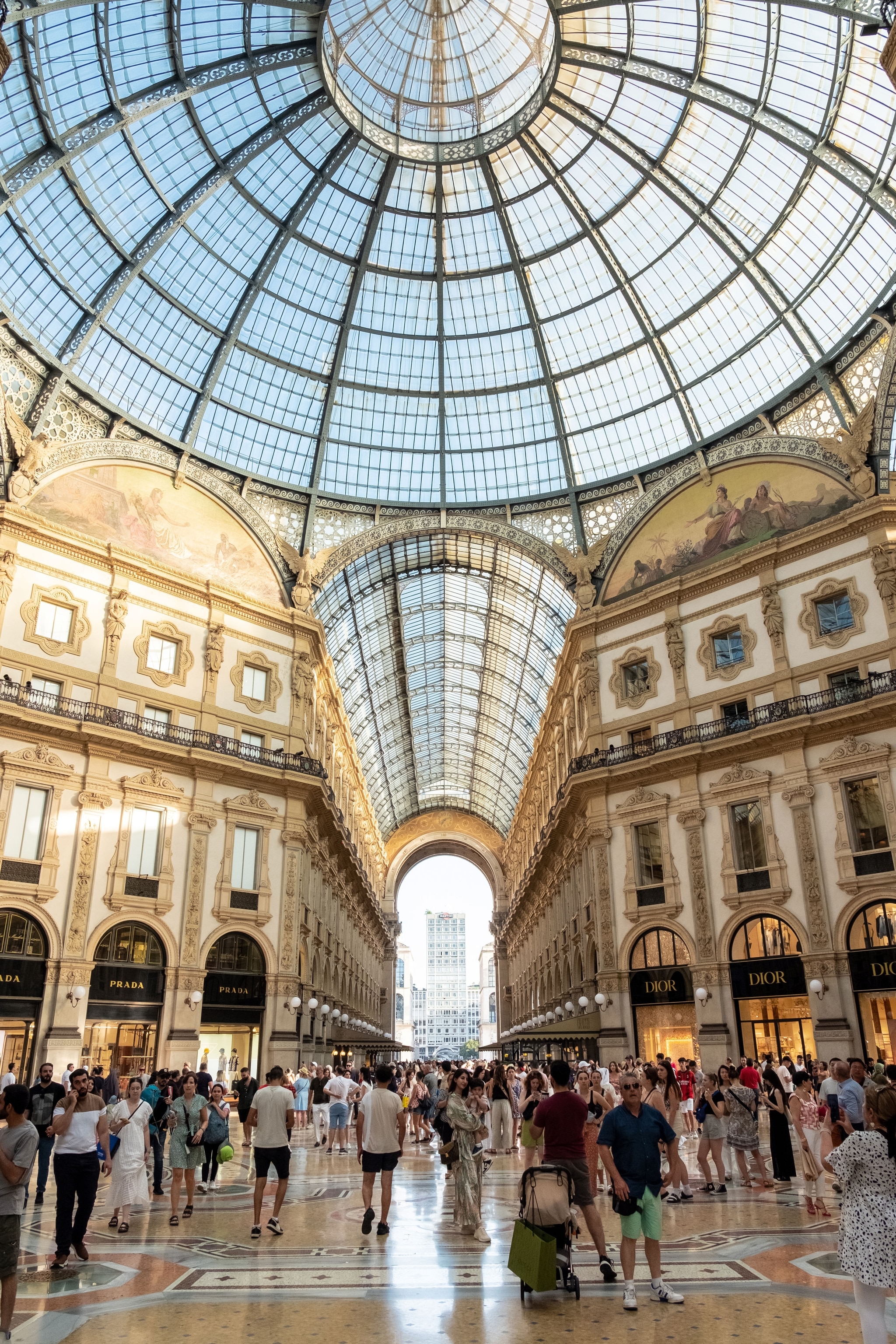 interior shot of busy shopping centre and open overhead ceiling