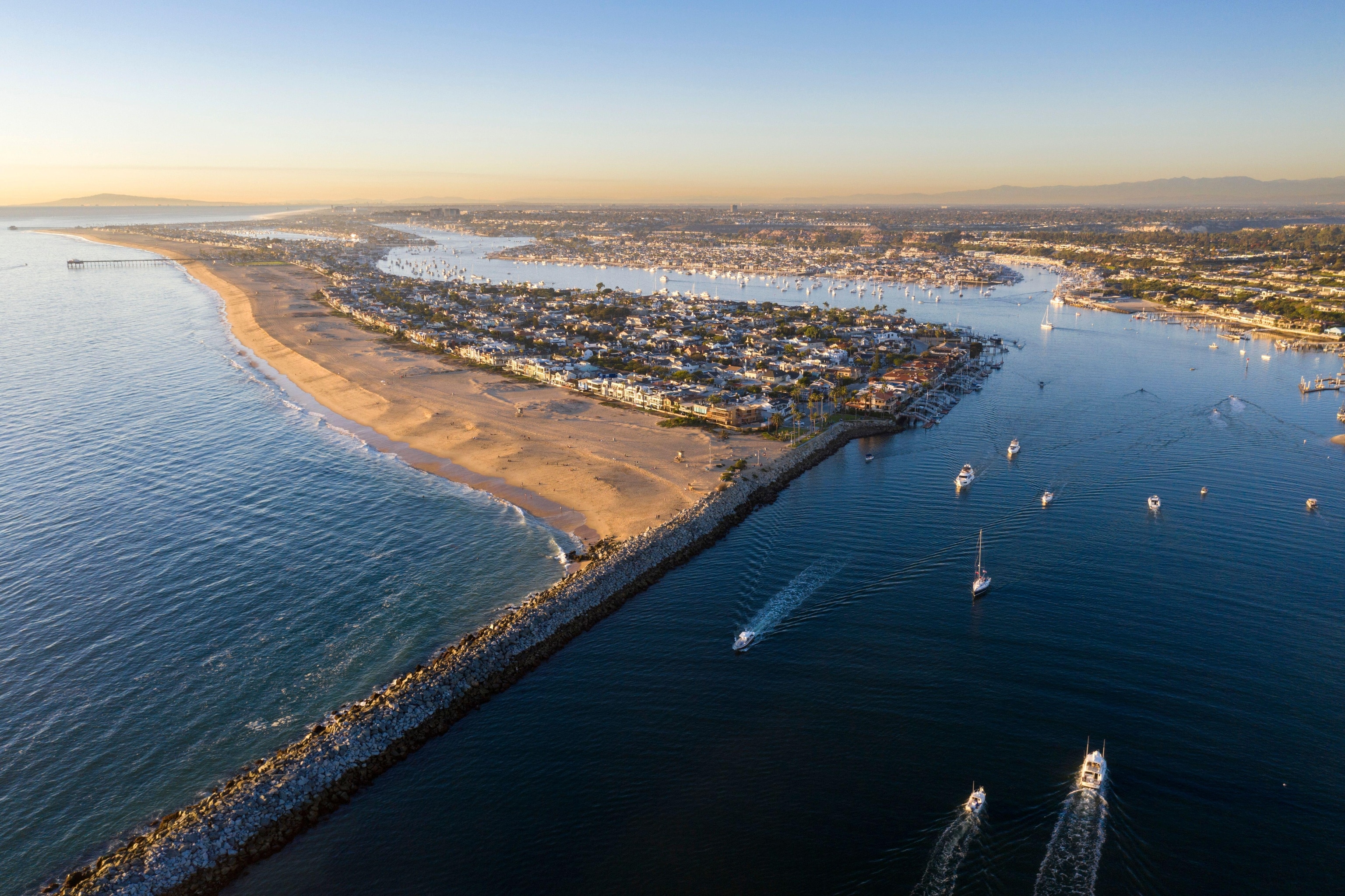 Aerial view of the Balboa Peninsula and Newport Harbor along the Orange County coast