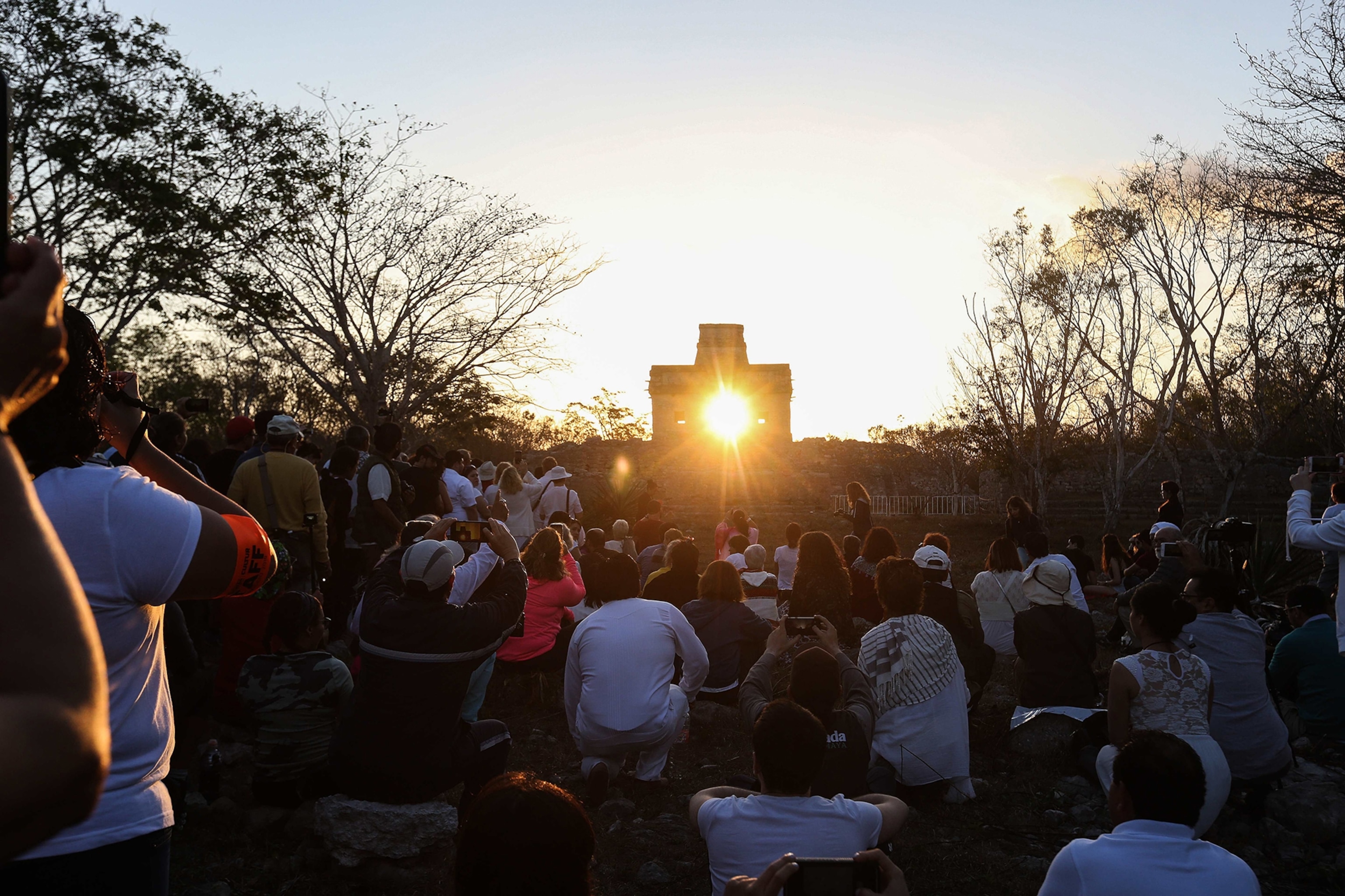 the sun rising at a Mexican temple.