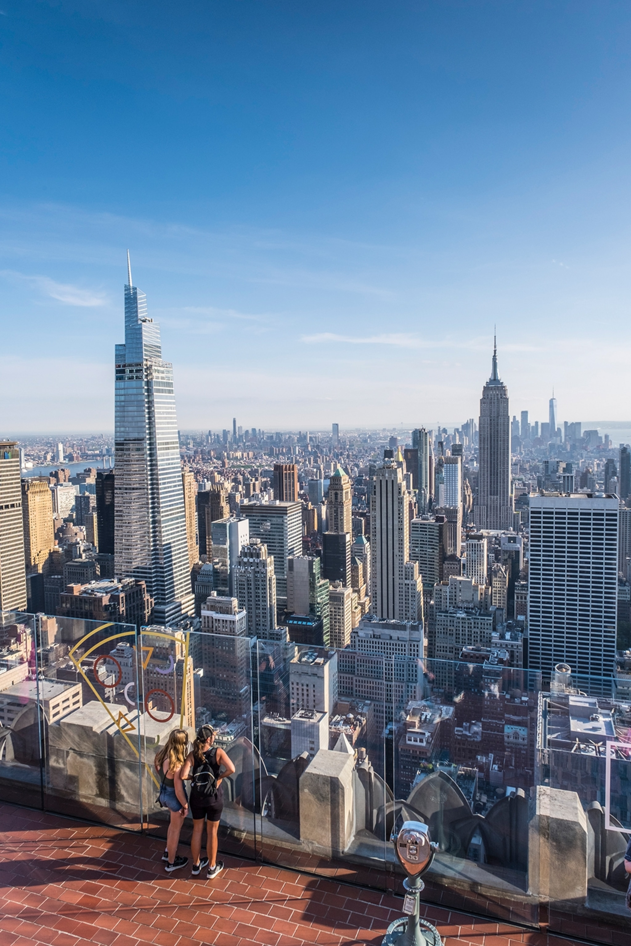 A viewing platform on a skyscraper overlooking the rest of Manhattan's skyline.