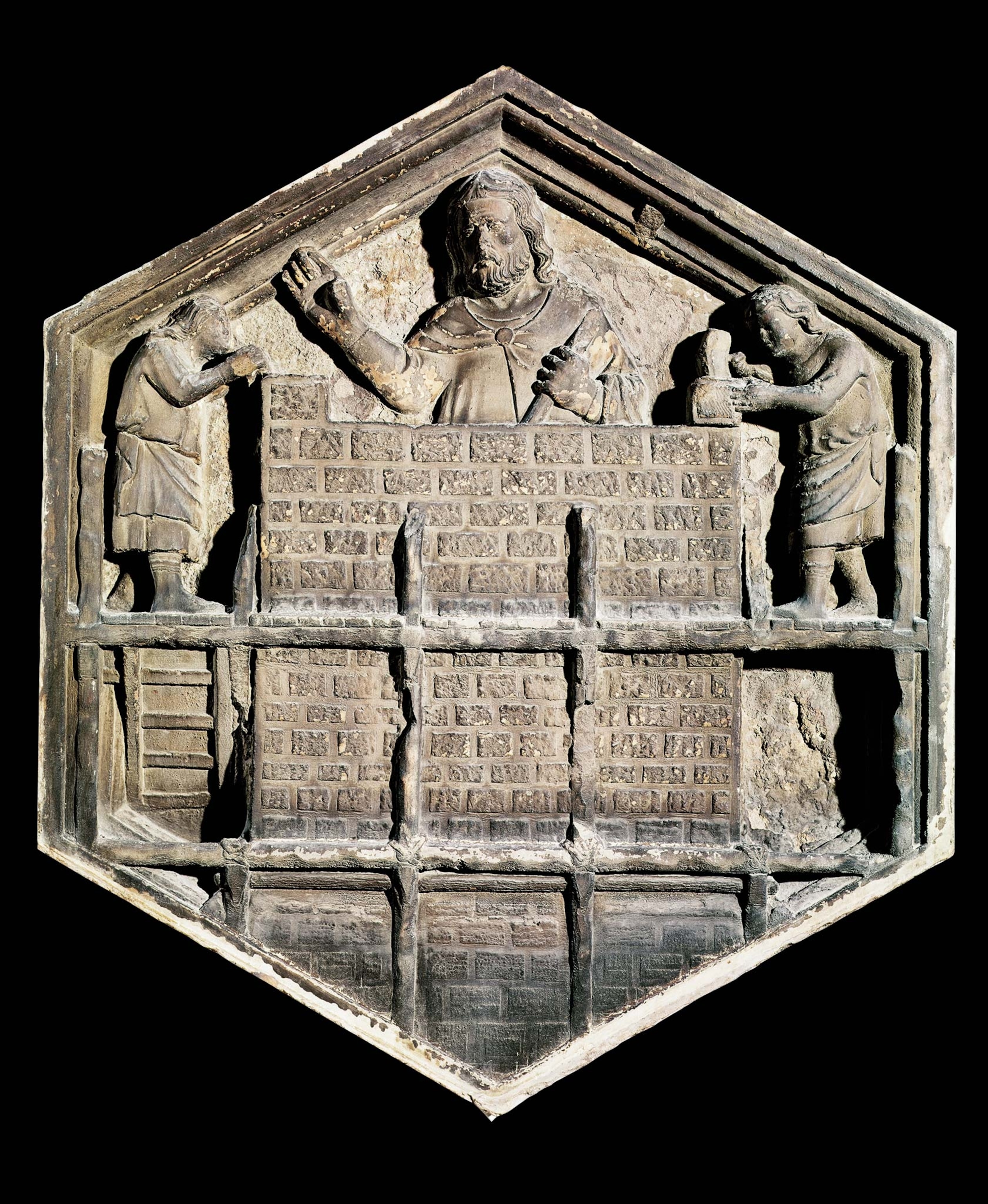 The master builder directs masons on a 14th-century decorative relief tile.