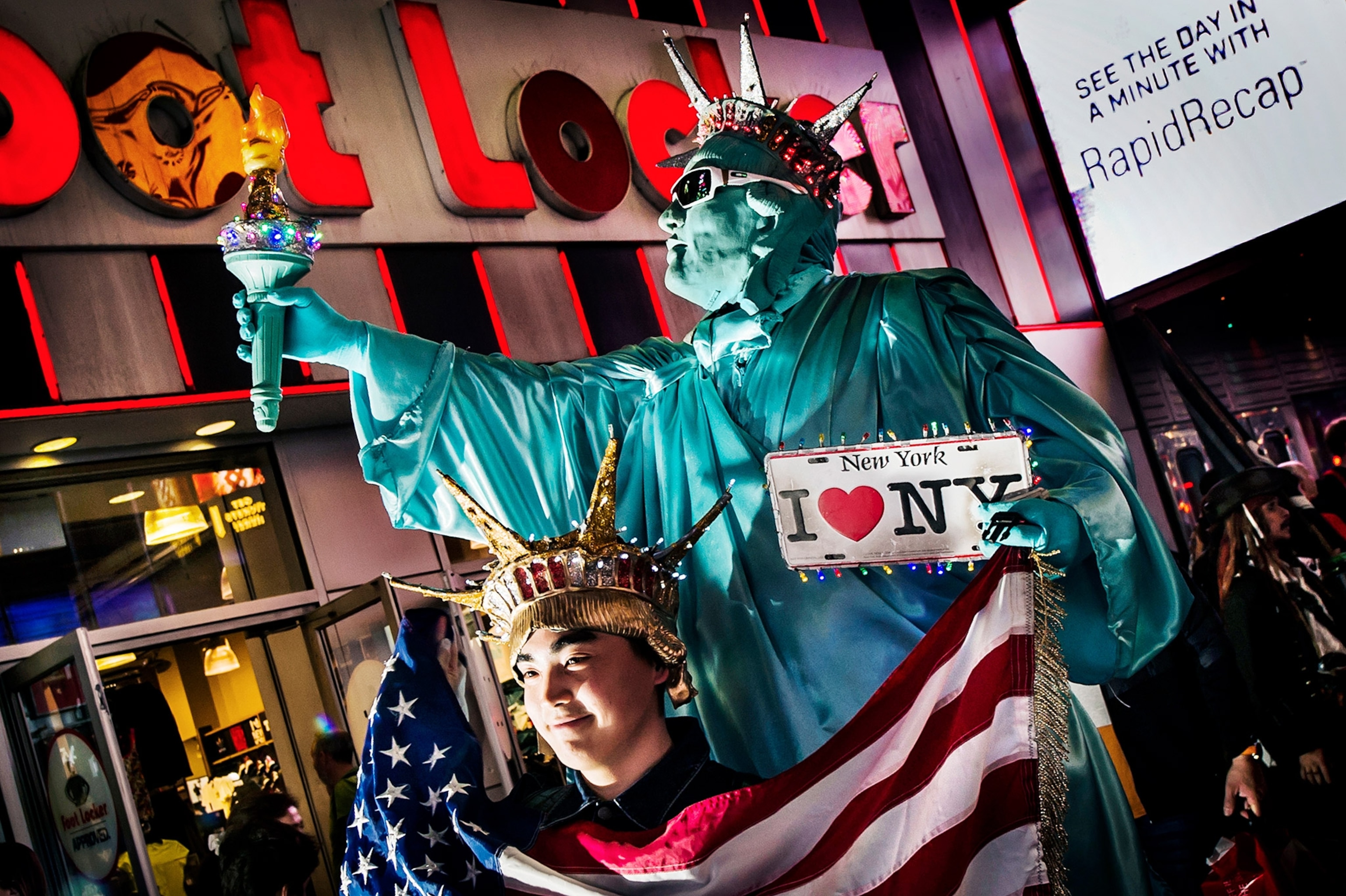 a person posing in Times Square in New York City