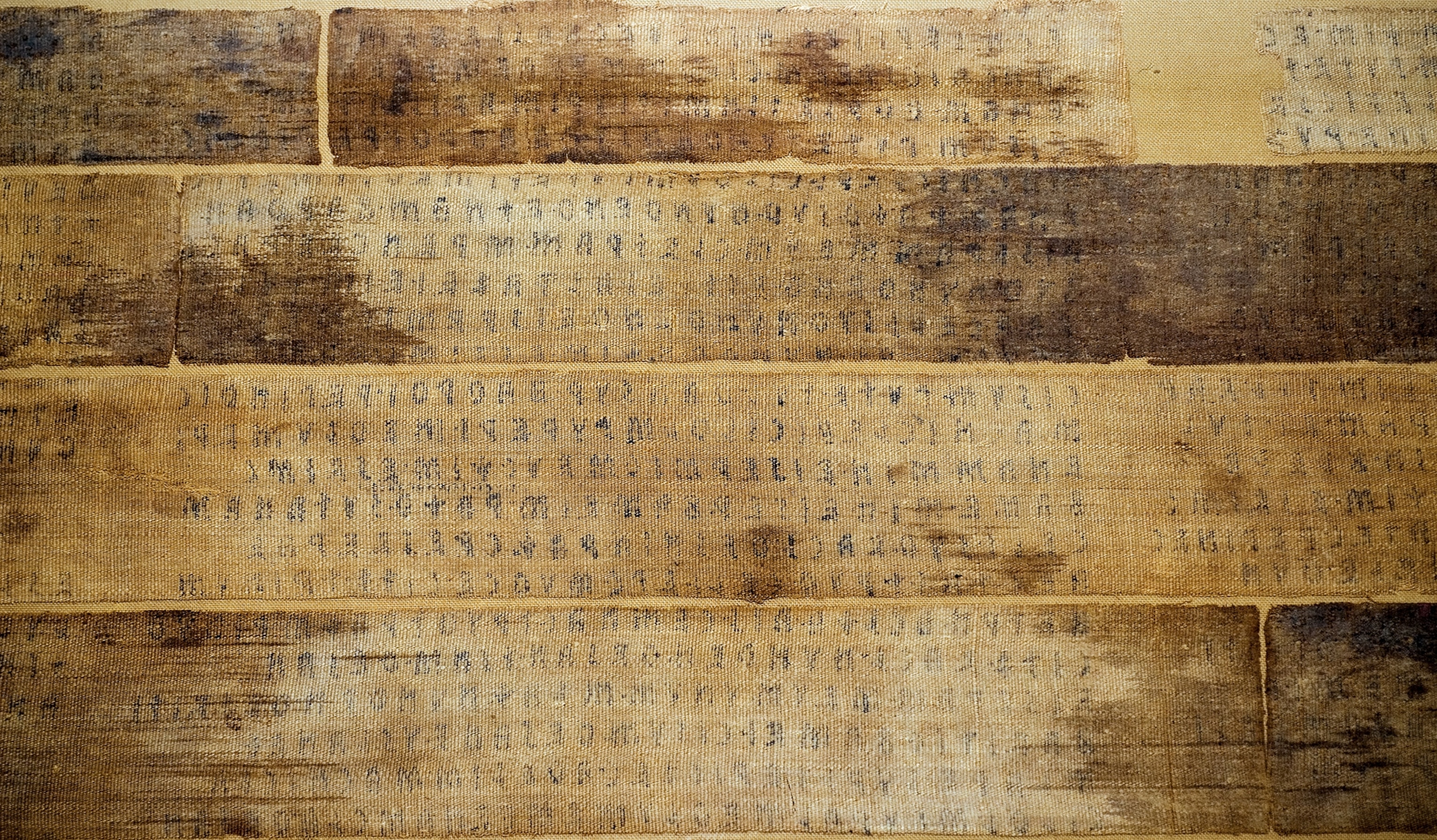 Etruscan letters form the Linen Book of Zagreb, later torn into strips to use as bandages to wrap an Egyptian mummy.