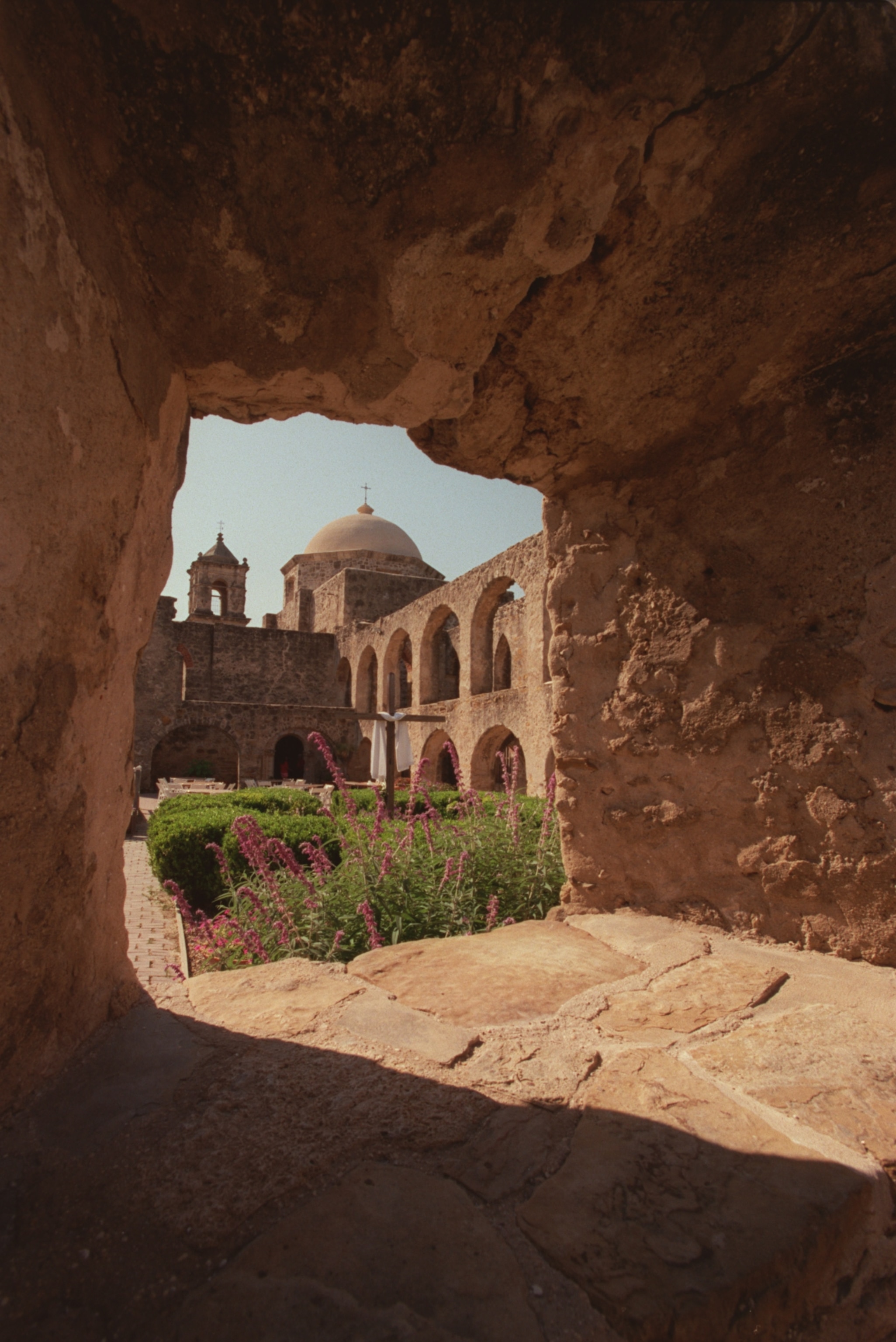 View through stone window of Mission San Jose in San Antonio, Texas