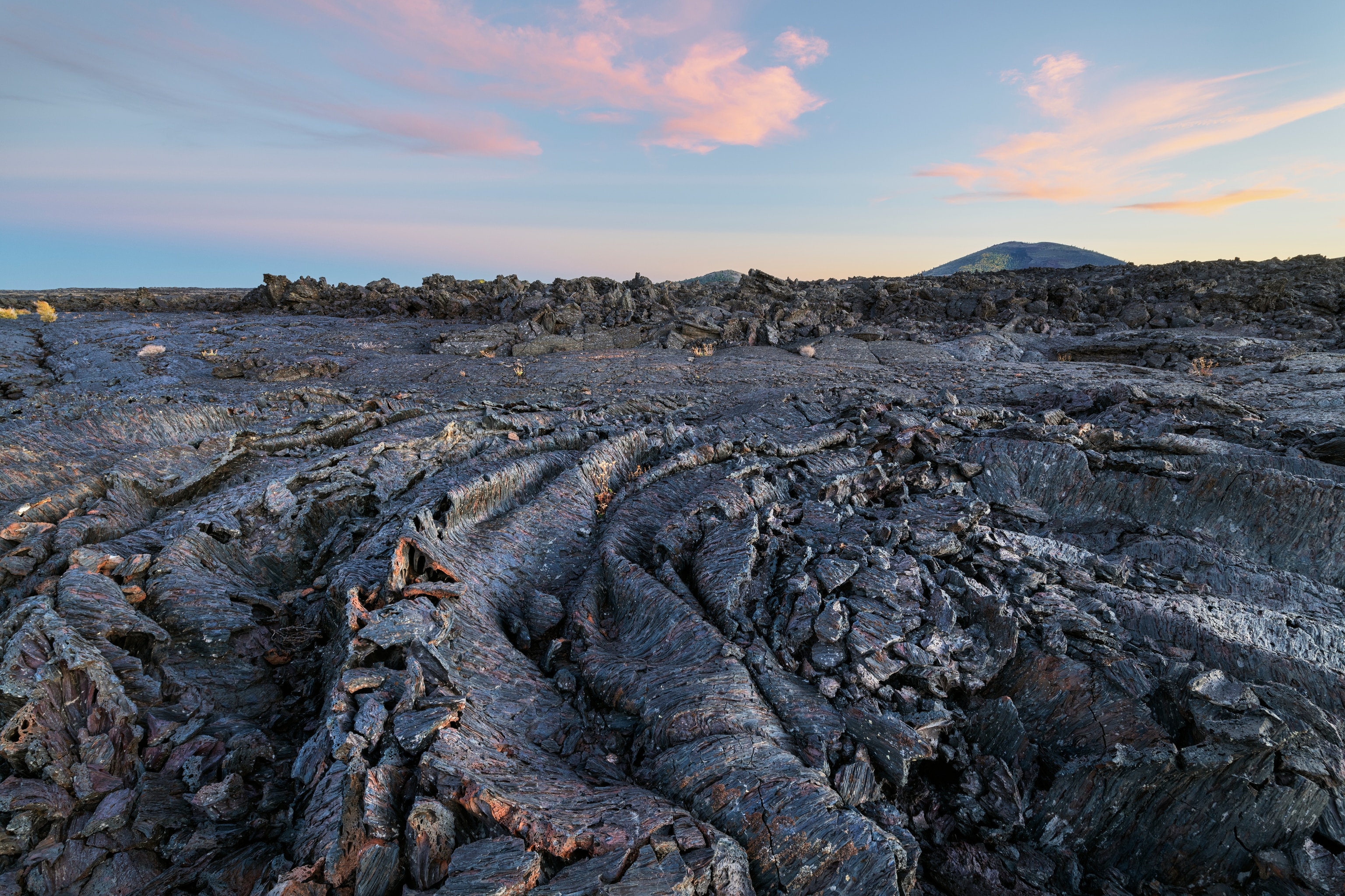 Twilight alpenglow over Blue Dragon Lava Flow, Craters of the Moon National Monument