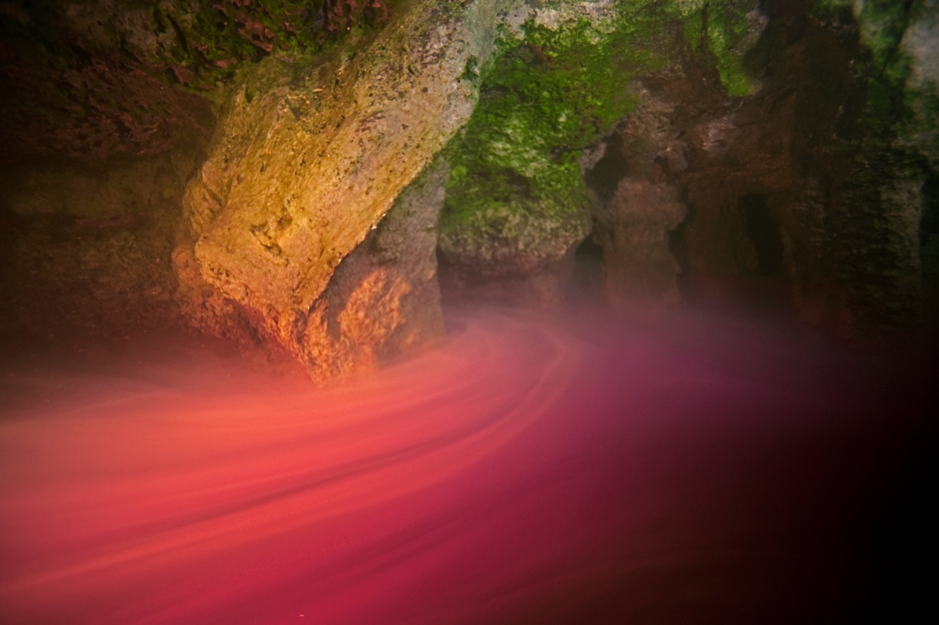 bacteria coloring water in an underwater cave