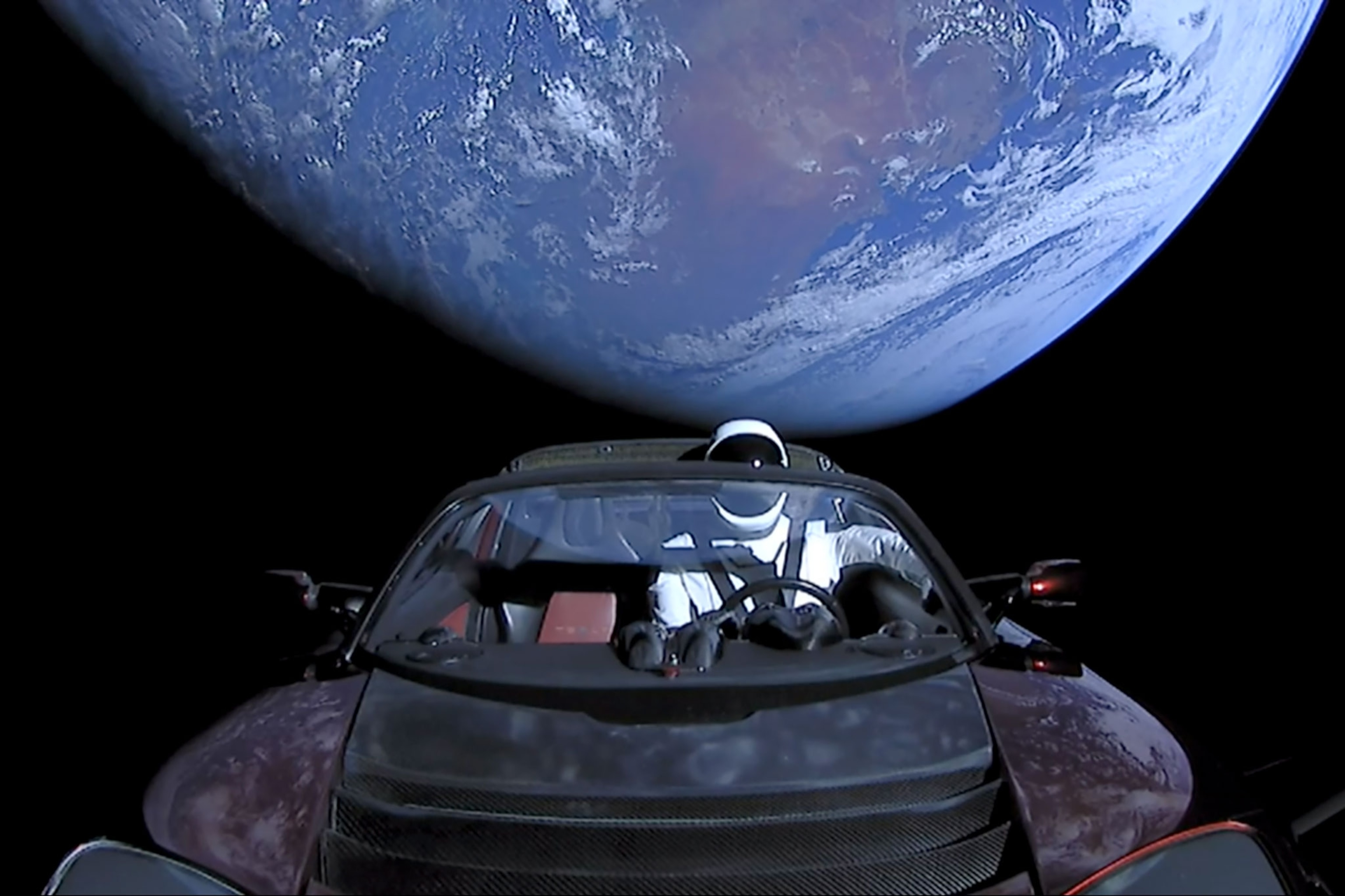 a Tesla roadster in space