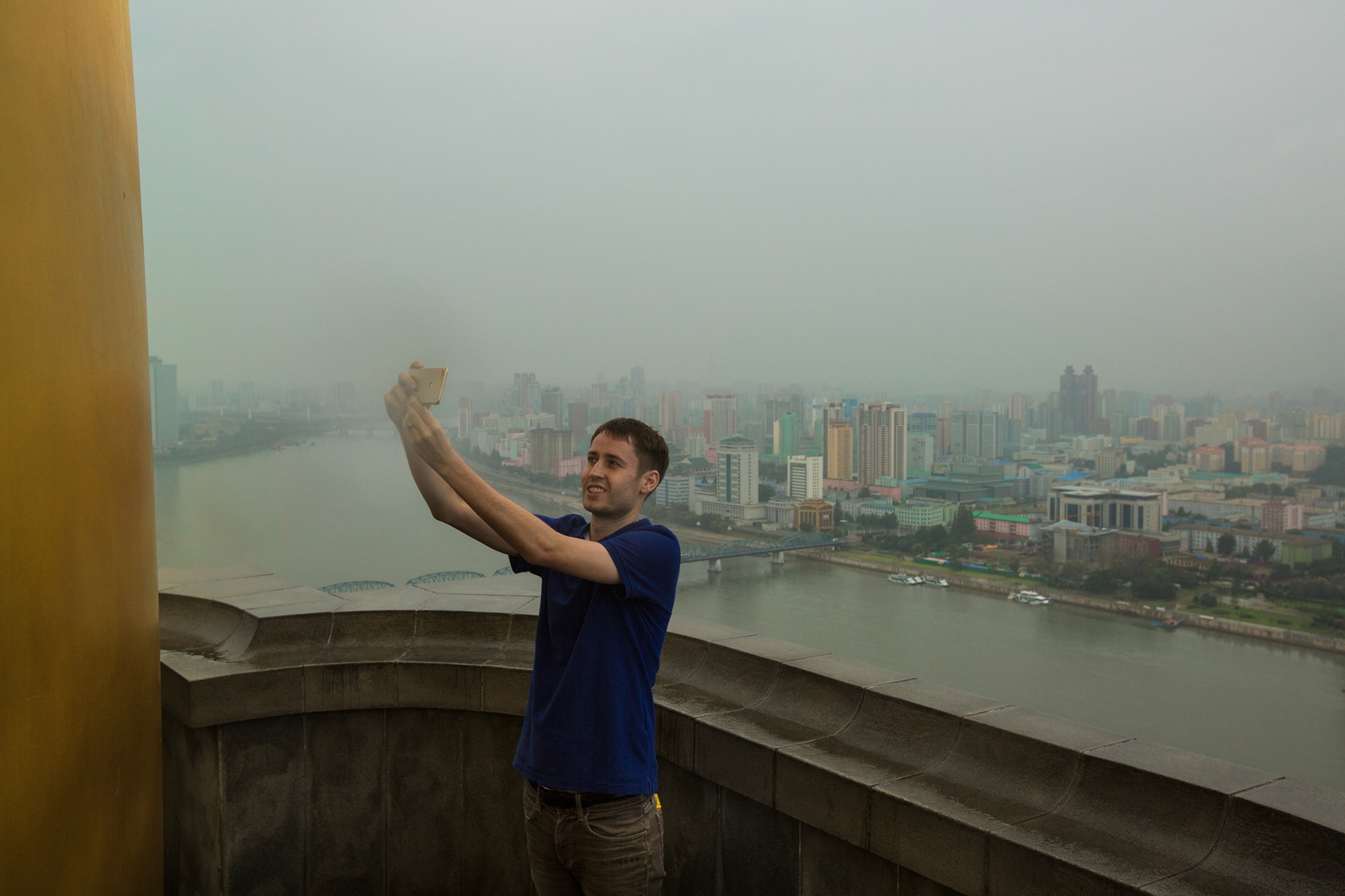tourist taking selfie in Pyongyang