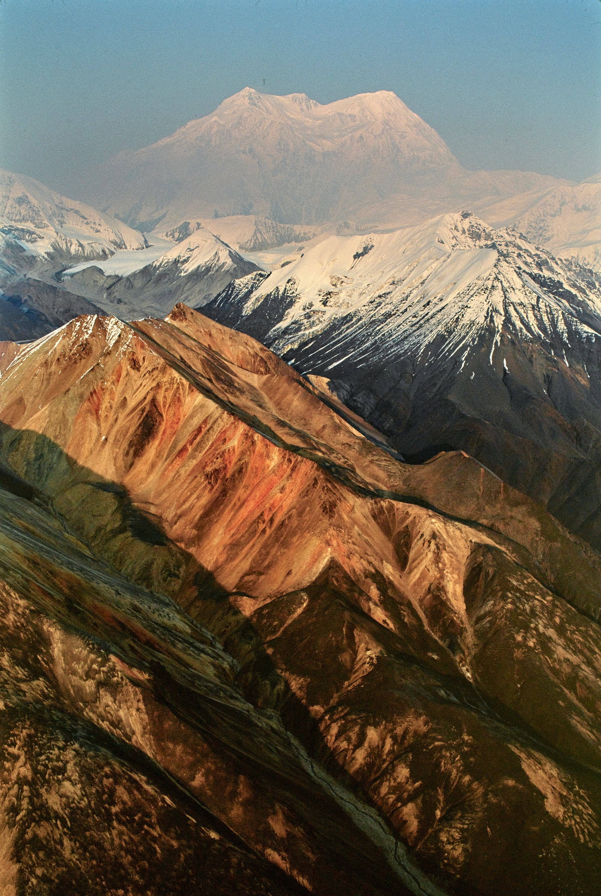 Golden sunlight hits Alaska's Range Mountains