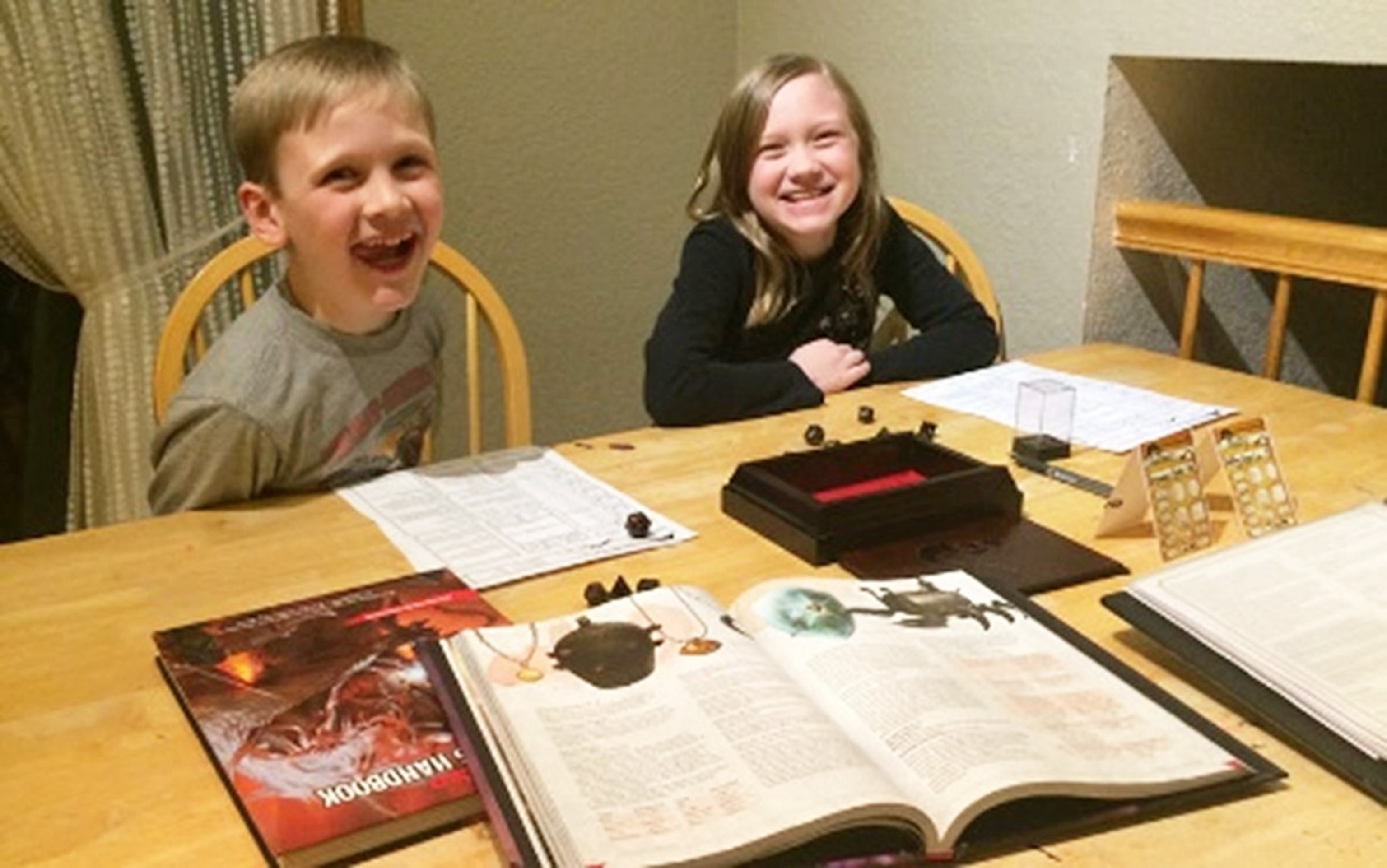 A boy and girl playing Dungeons and Dragons. Nashville, Tennessee.