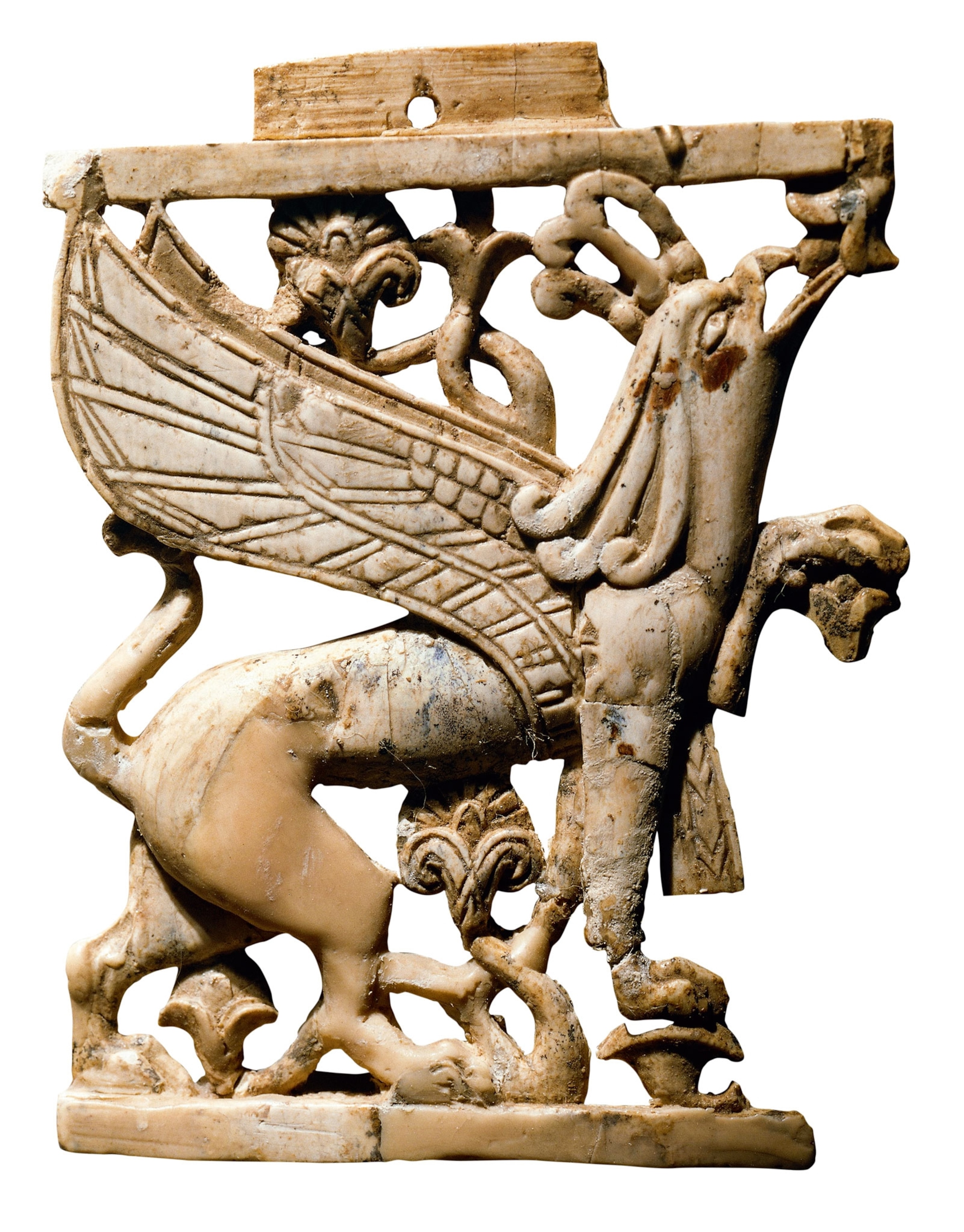 an ivory plaque with a gryphon found at Nimrud