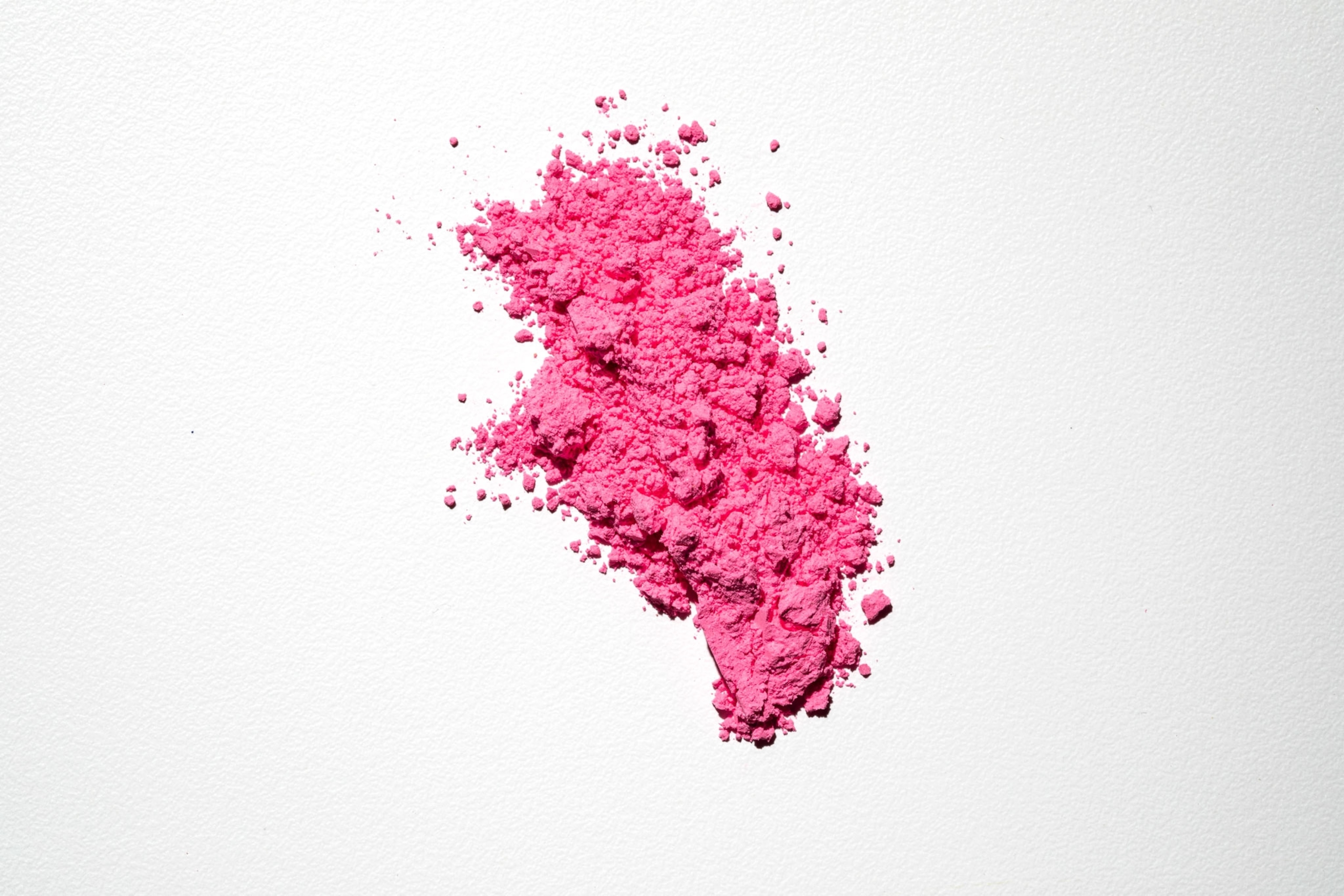 powdered pink pigment on white