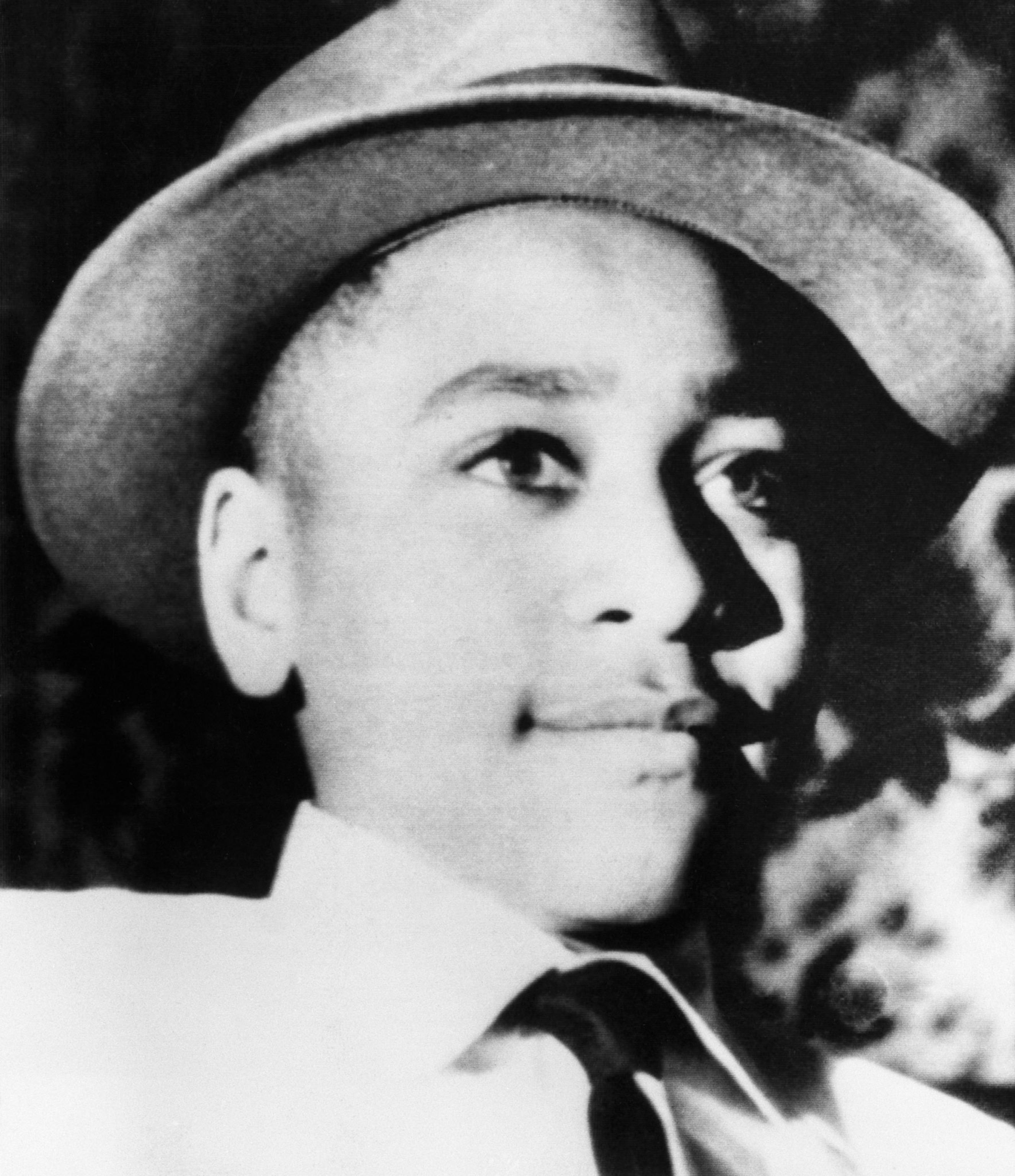 Young Emmett Till wearing a hat in a portrait.