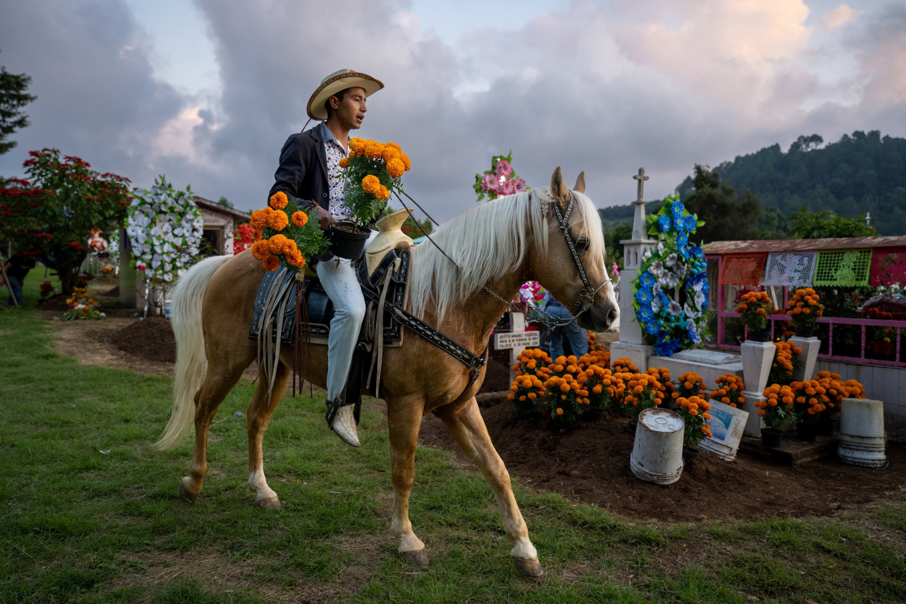 Man riding horse for day of the dead.