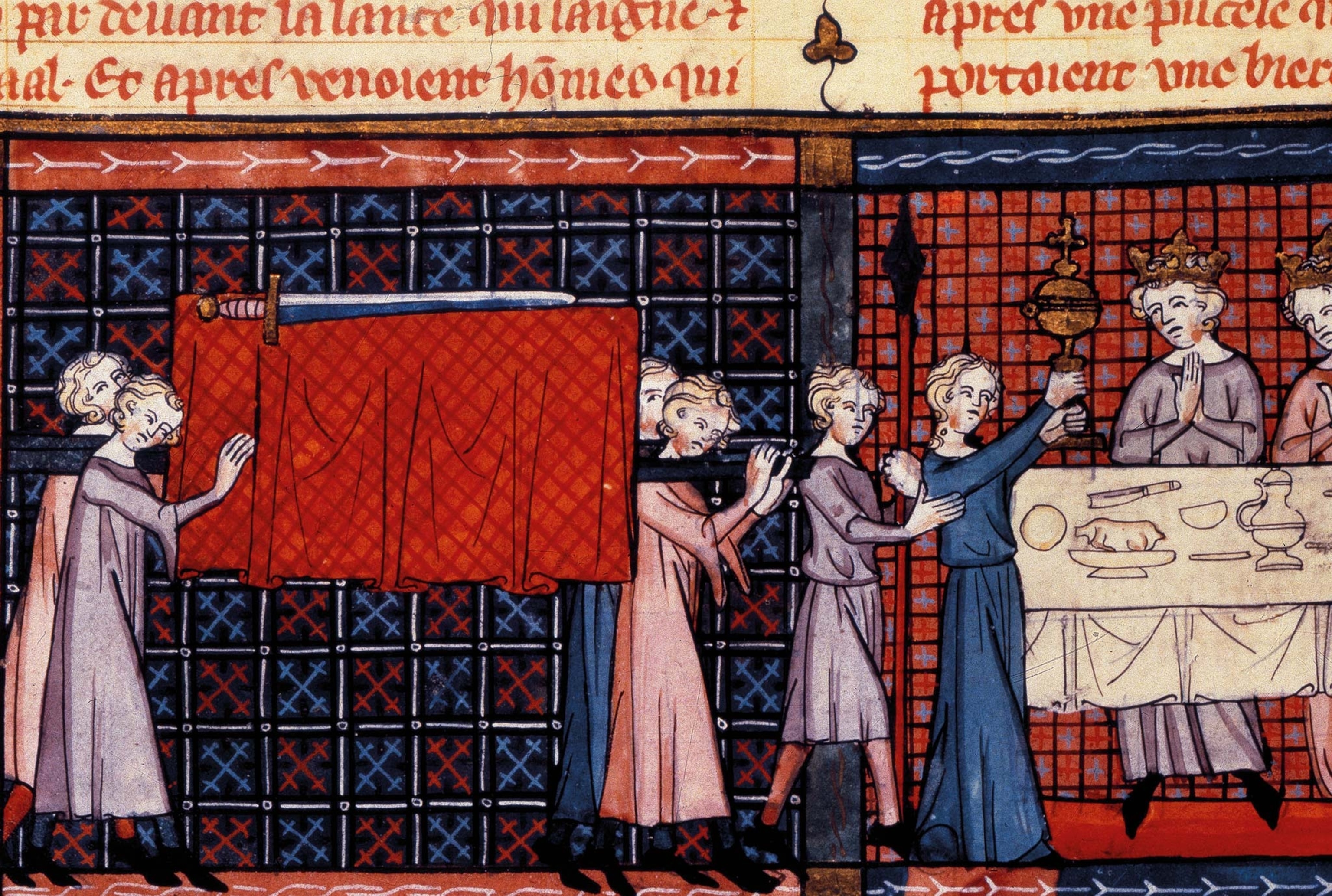 The procession of the grail in the castle of the Fisher King, shown in a miniature from a 14th-century edition of Perceval, the Story of the Grail, by Chrétien de Troyes.