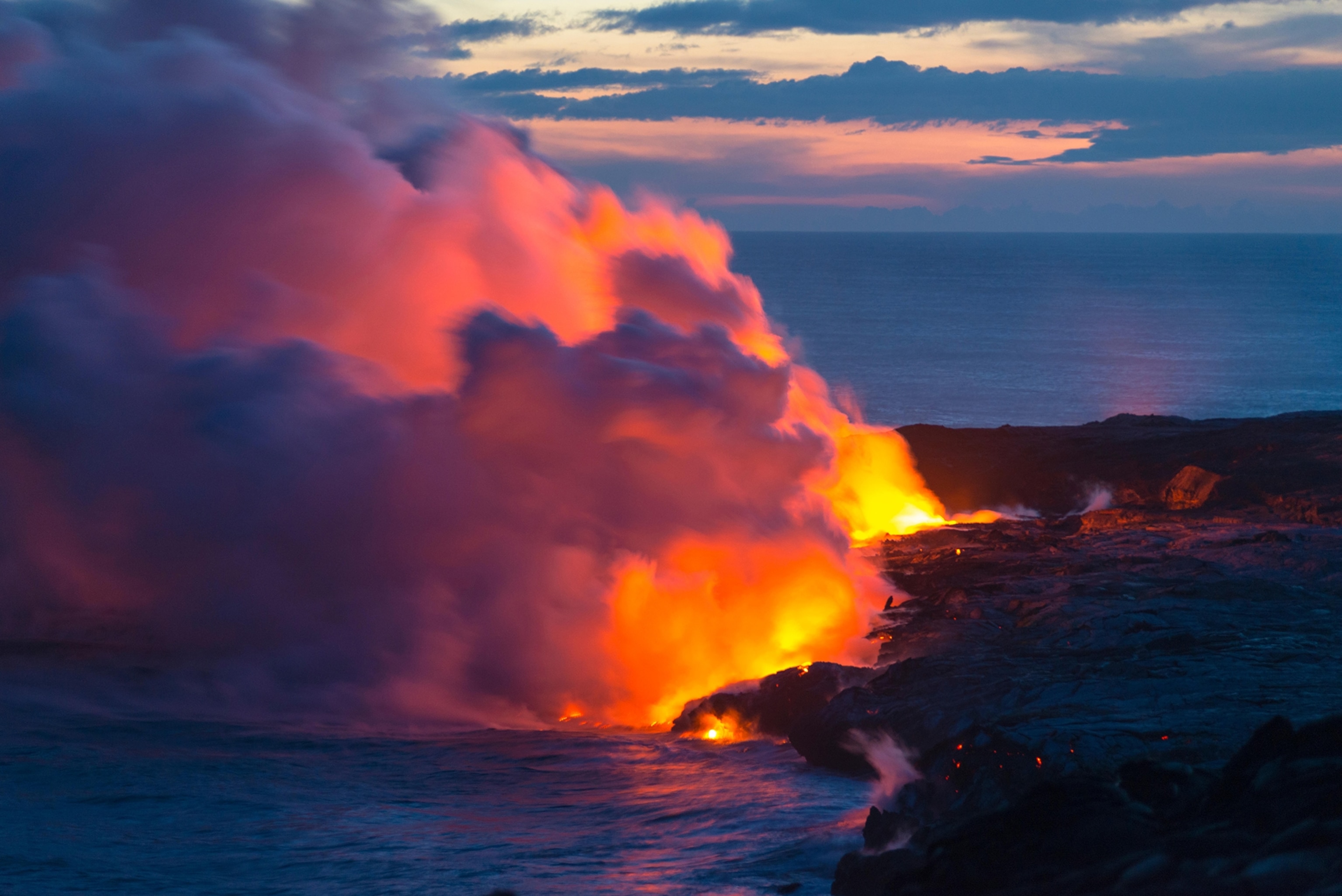 lava flowing into the ocean in Hawaii.