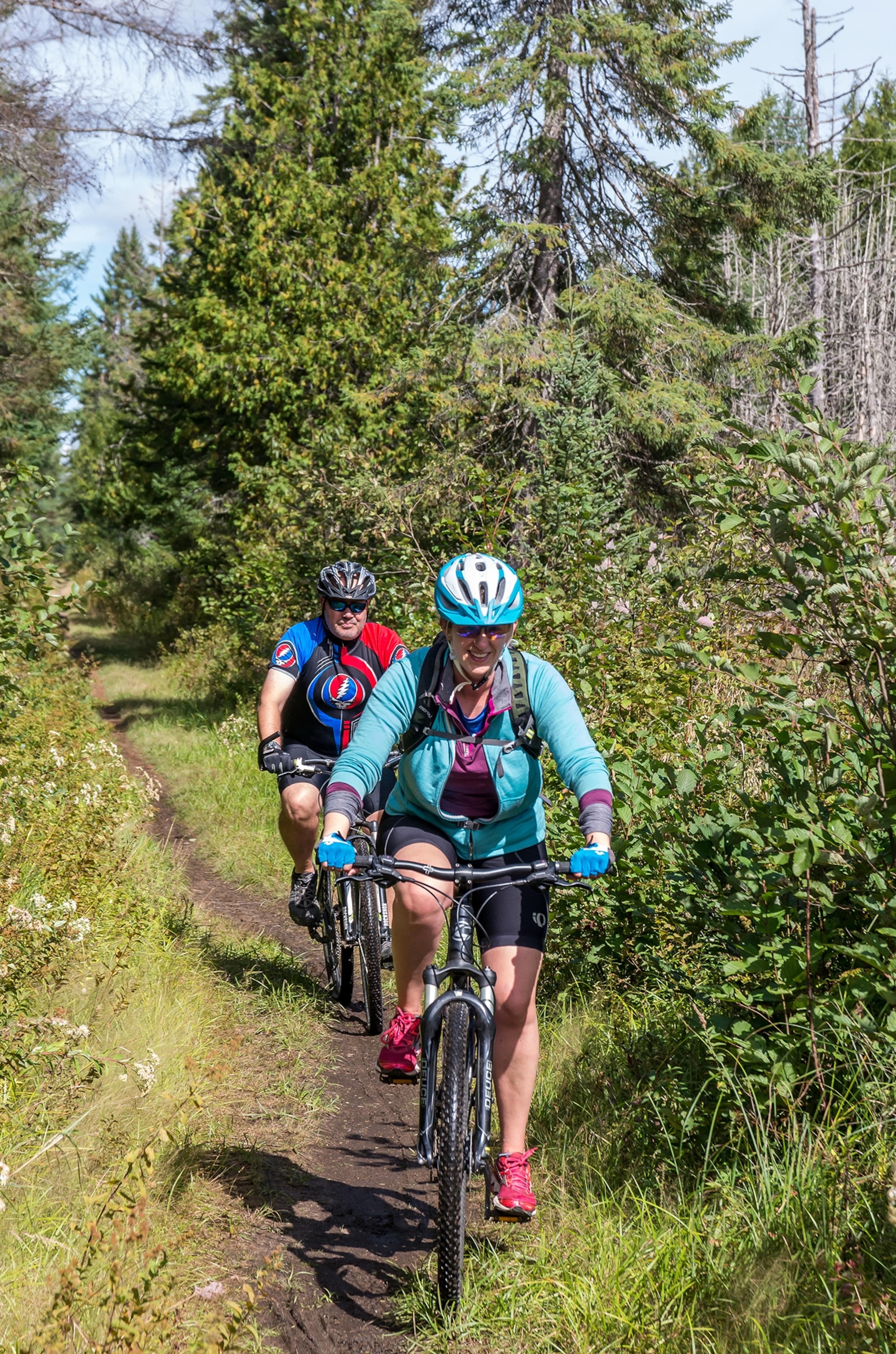 Mountain bikers on the Bloomingdale Bog Trail in Saranac Lake NY