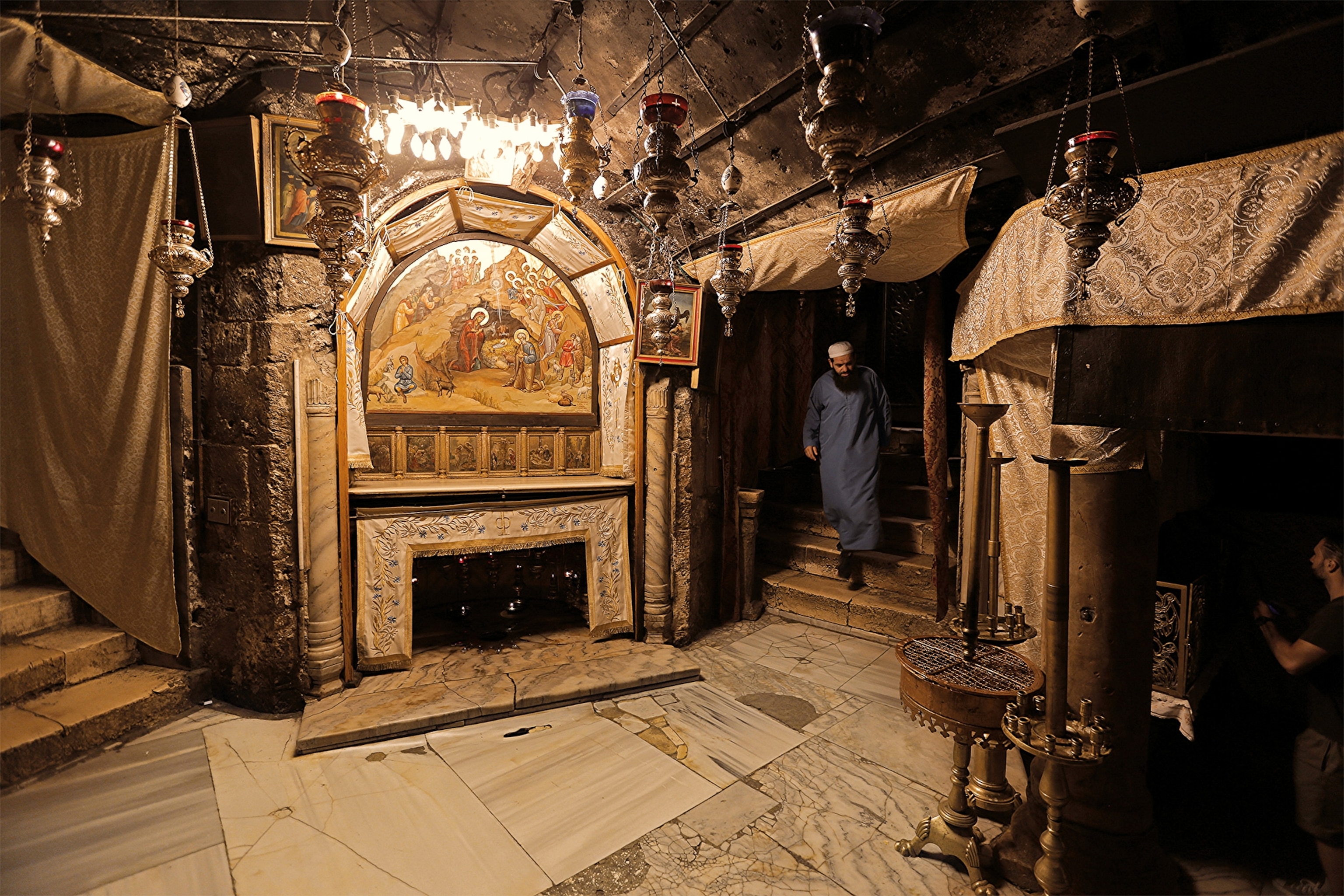 The Church of the Nativity in Bethlehem is believed to house the site where Mary gave birth to Jesus. Tradition holds that the silver star in the niche marks the exact location.