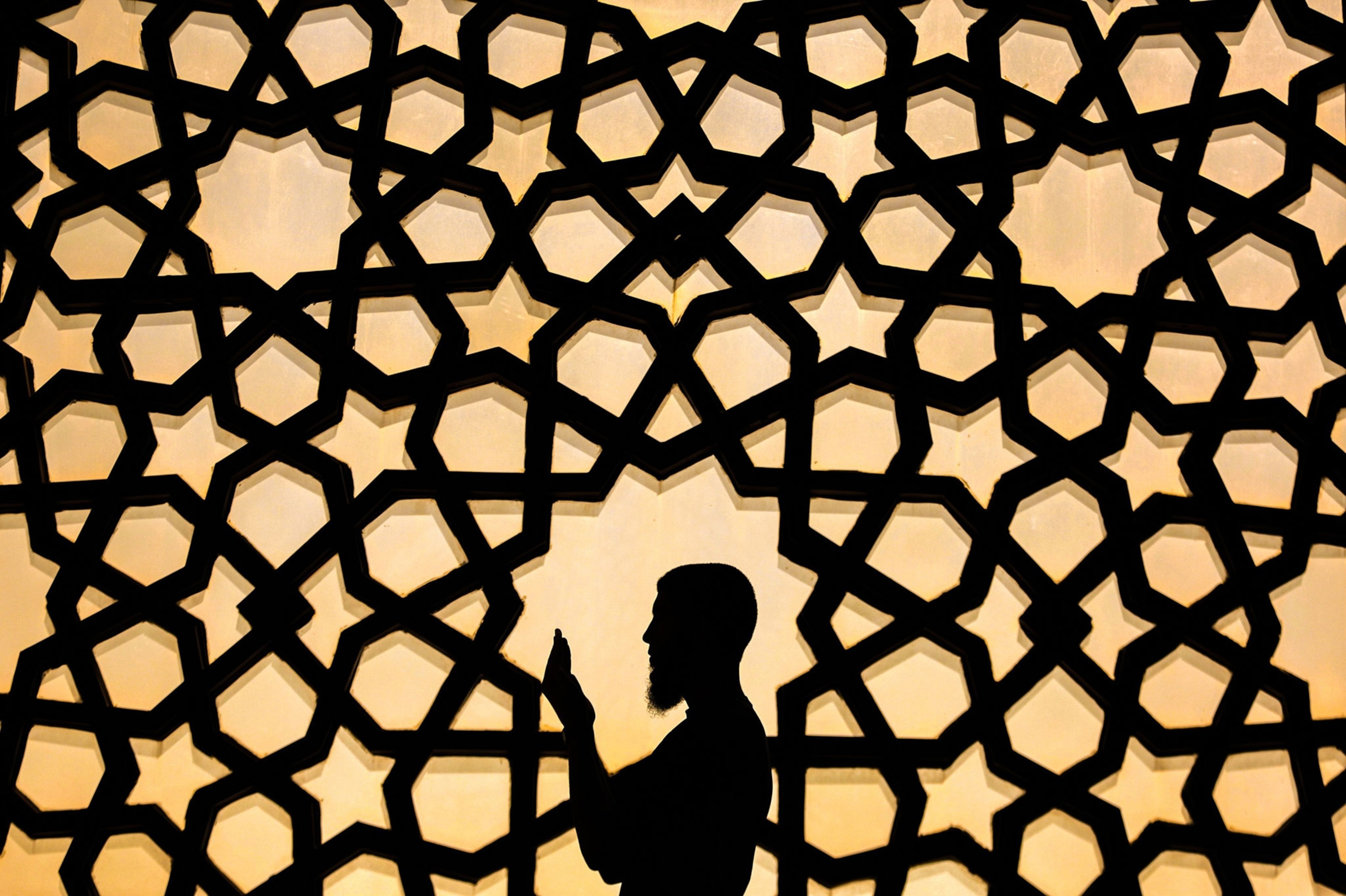 a Muslim man praying.