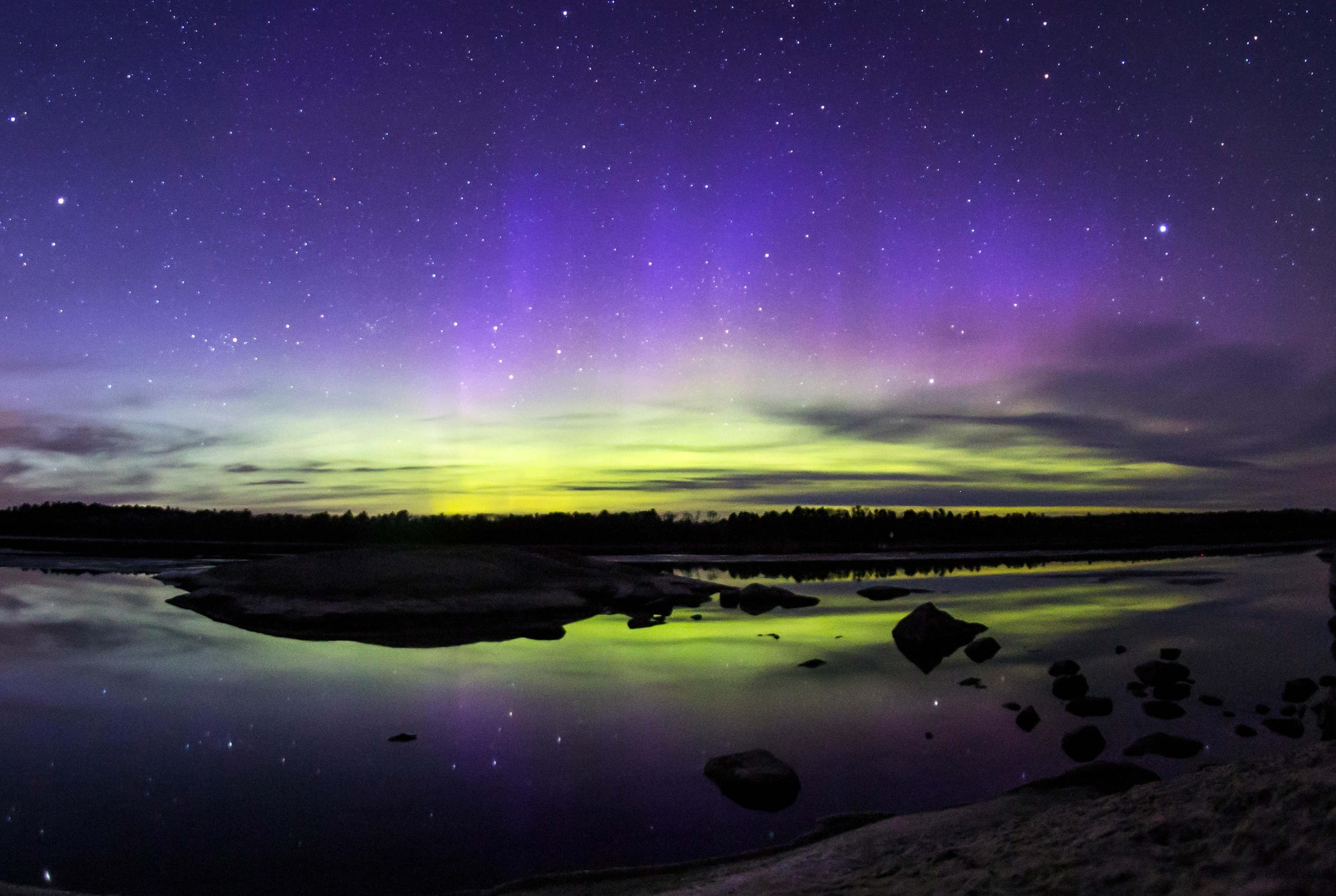 The Northern Lights over the skies of Voyageurs National Park in northern Minnesota