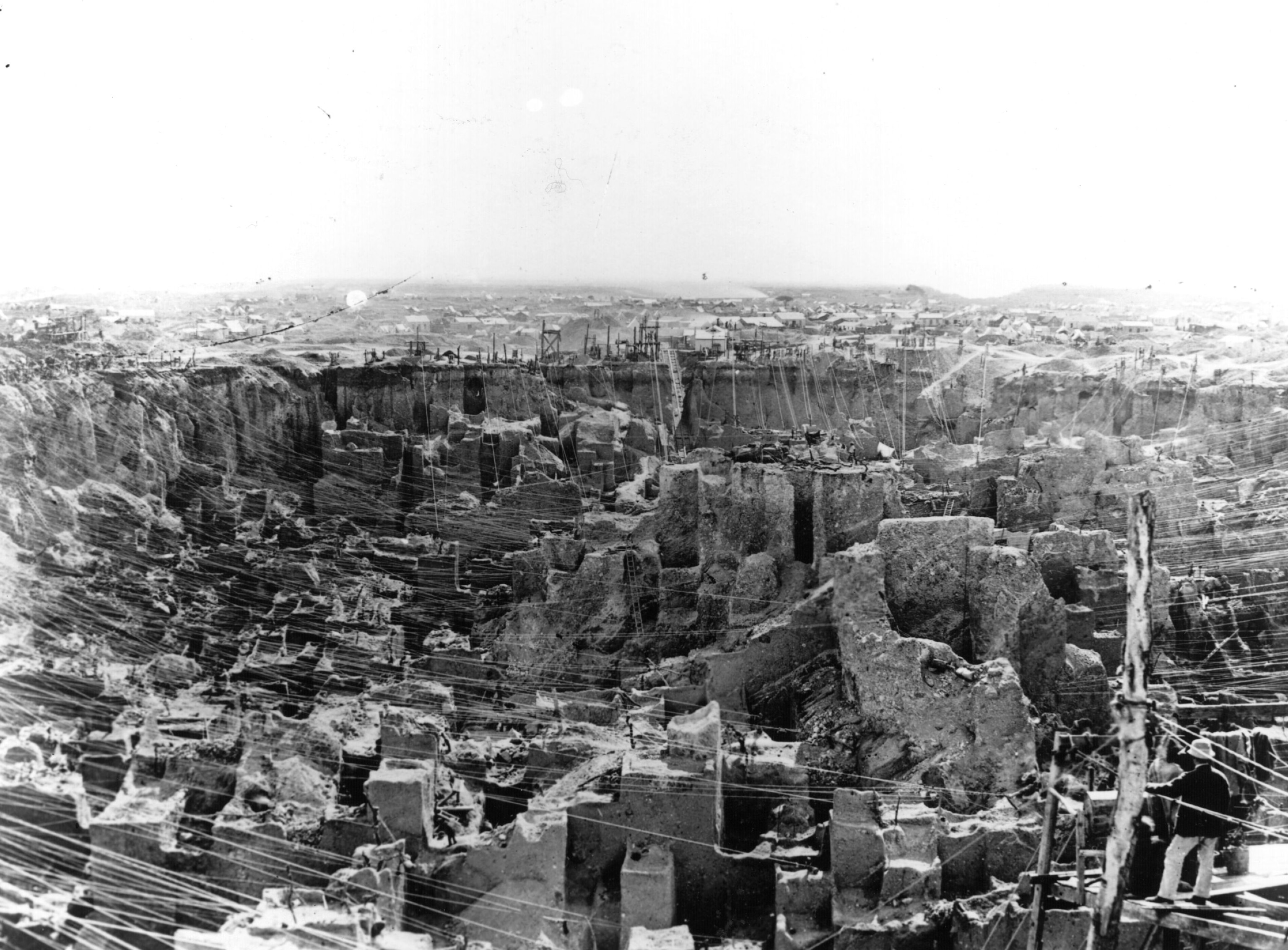 a black and white photograph of a large mine