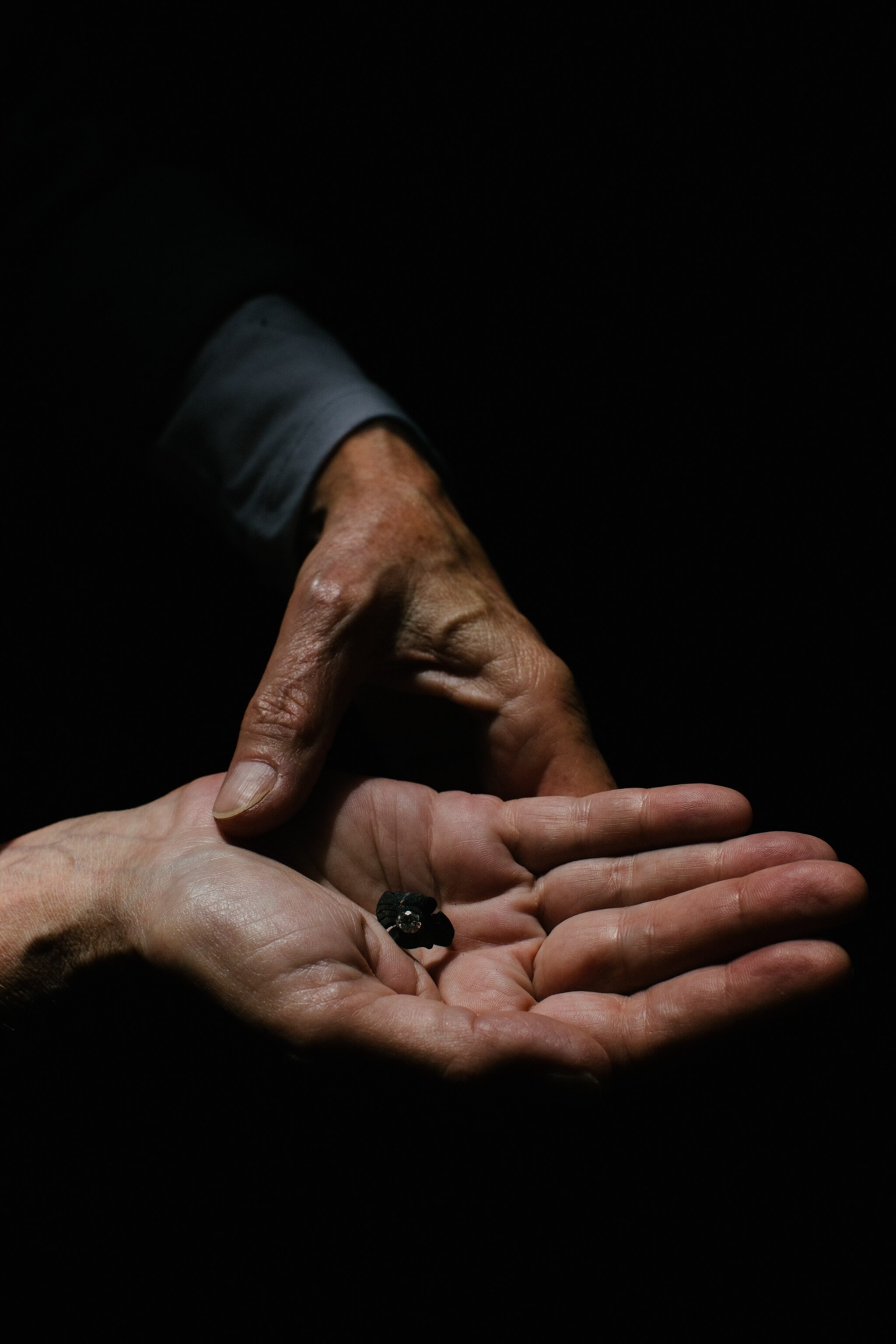 Libby holding the blackened ring