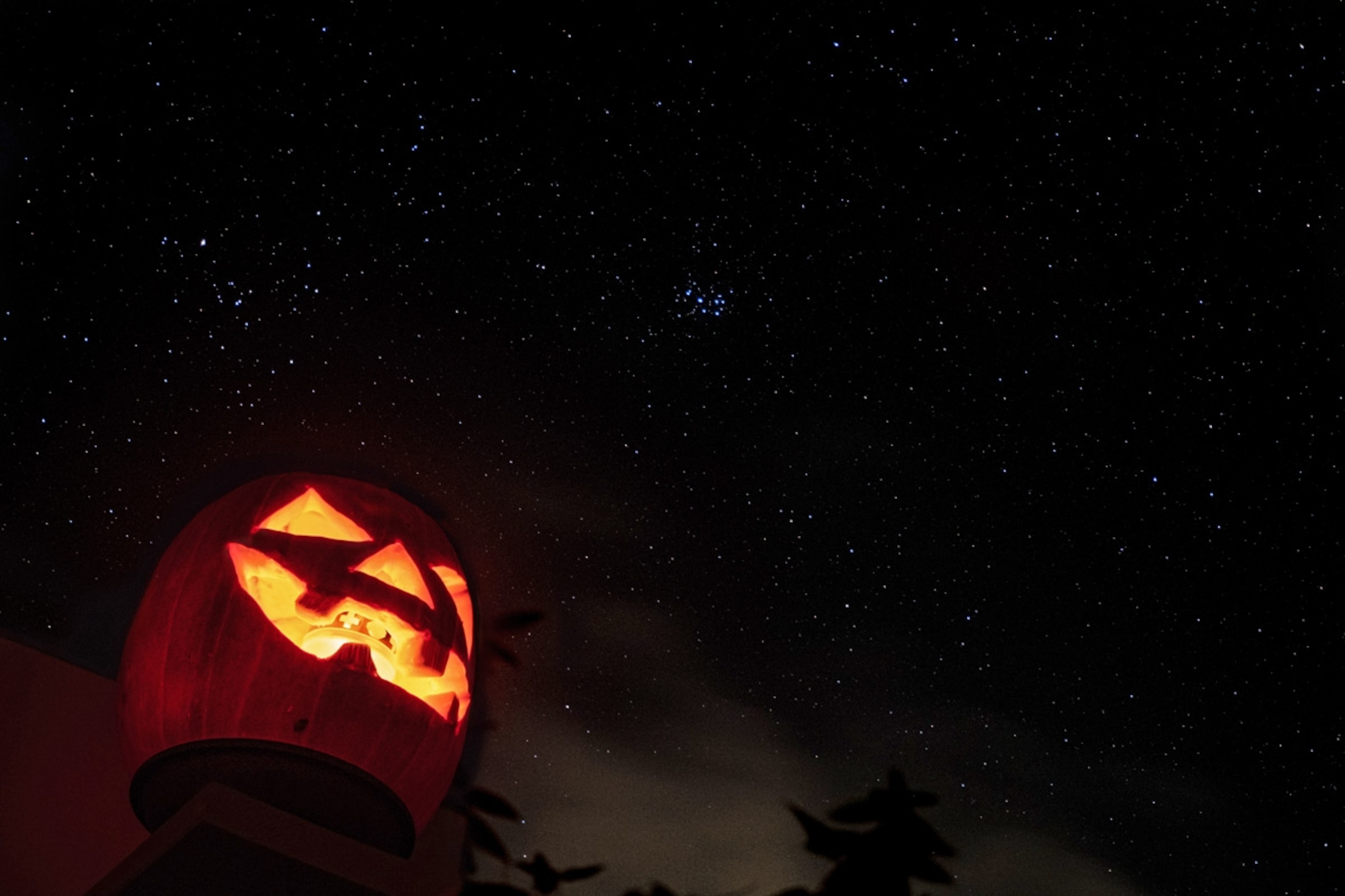 Low Angle View Of Jack O Lantern Against Sky At Night. (Germany)