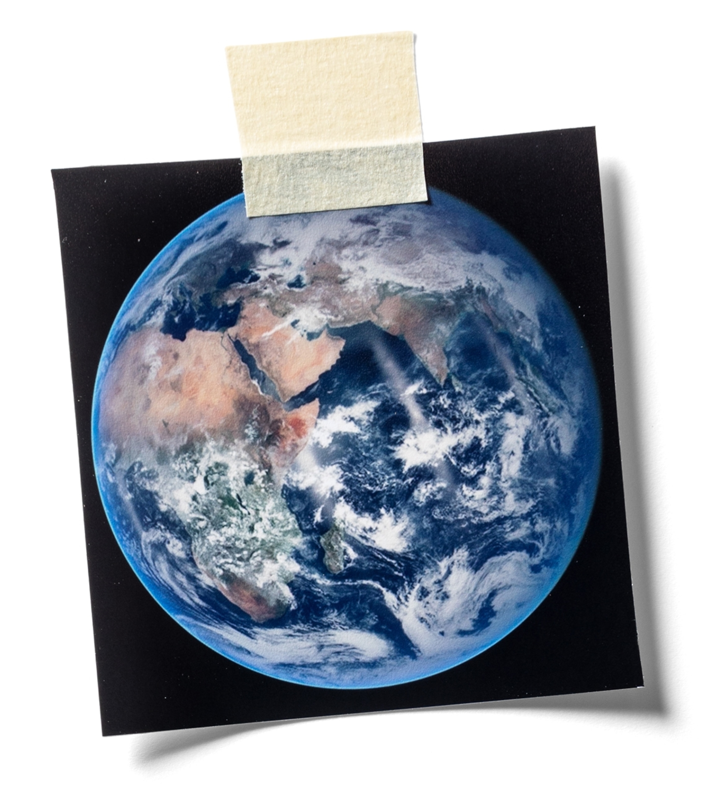 Blue Earth photograph taped with a sticker.