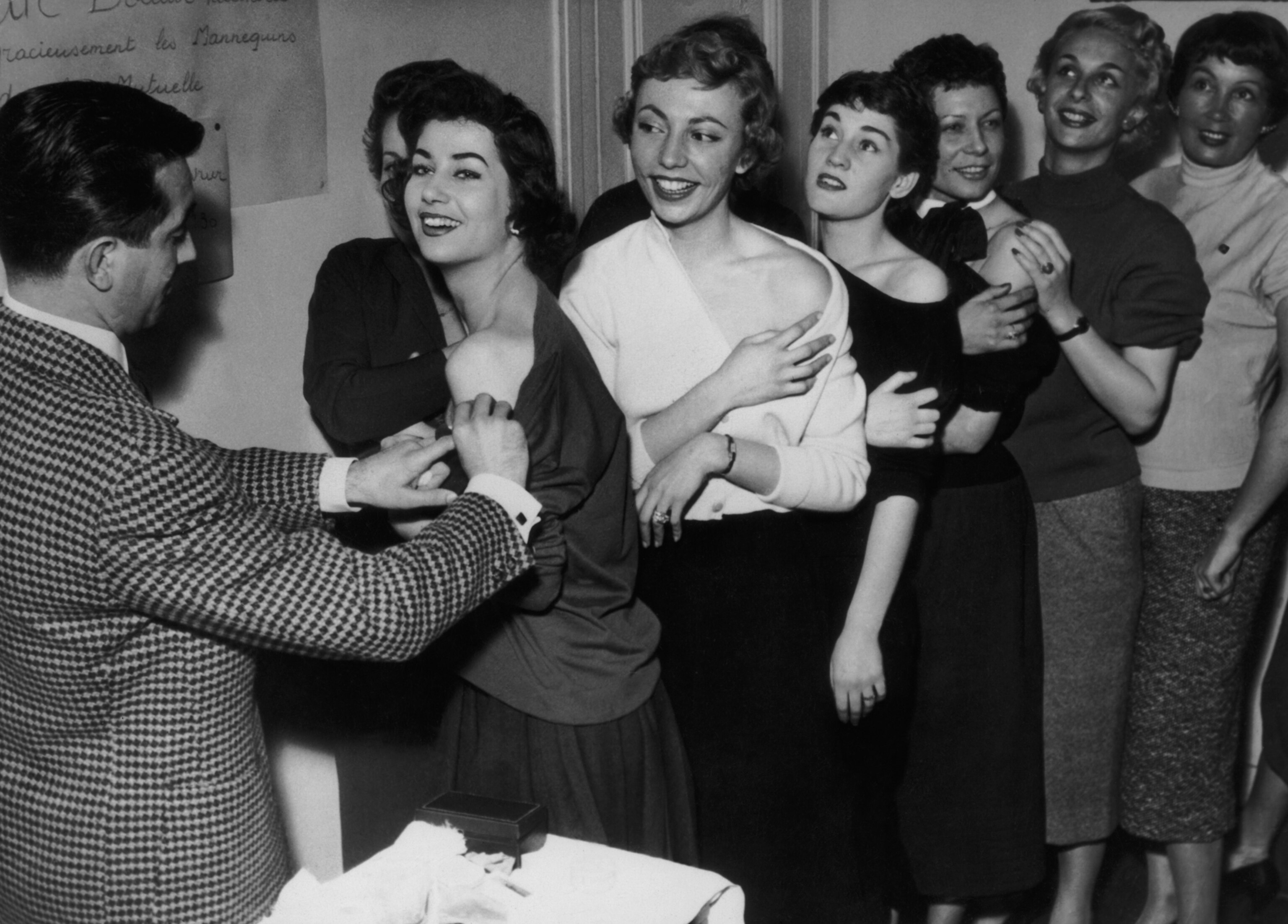 Picture of a group of French models in line to be vaccinated against smallpox.