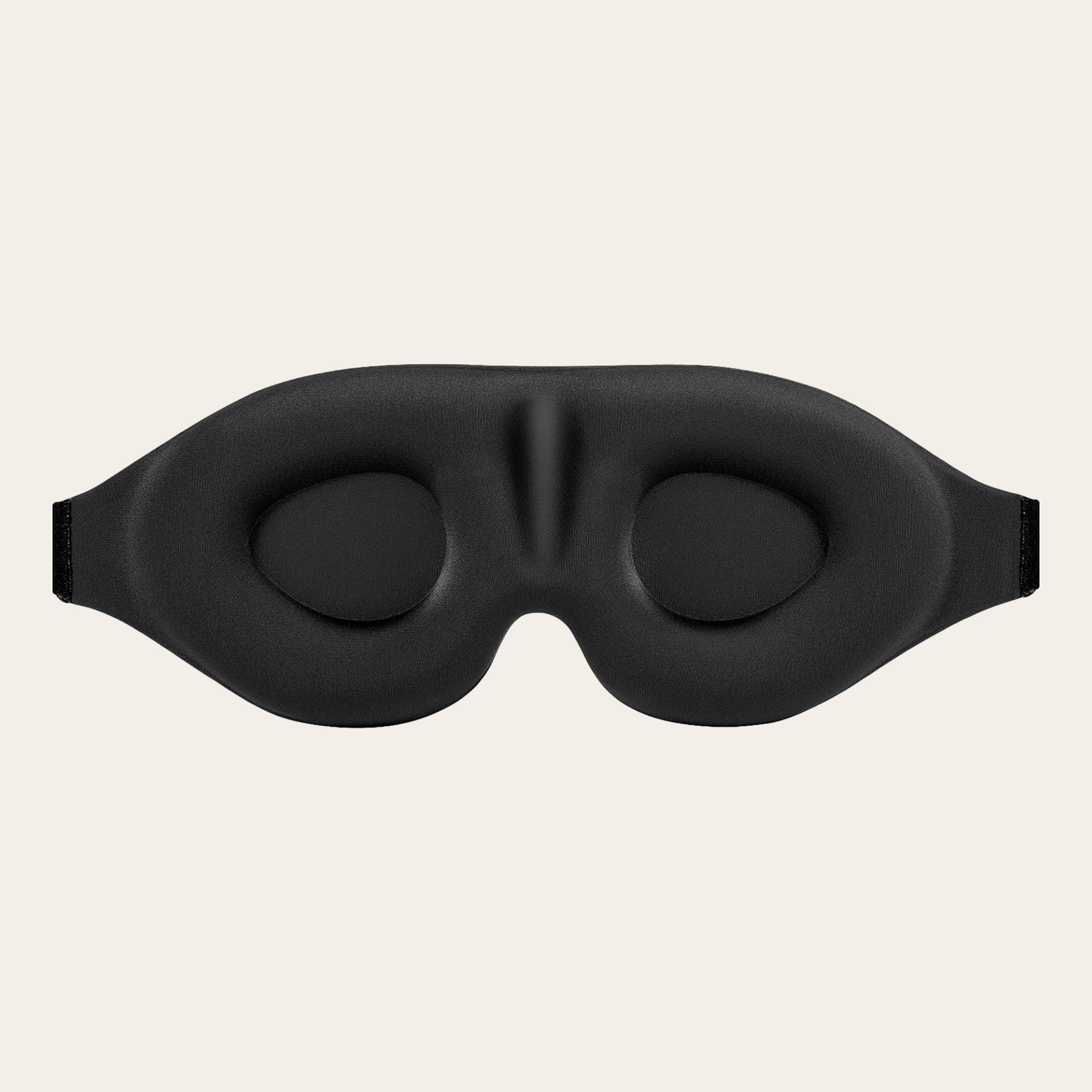 A black sleep eye mask.