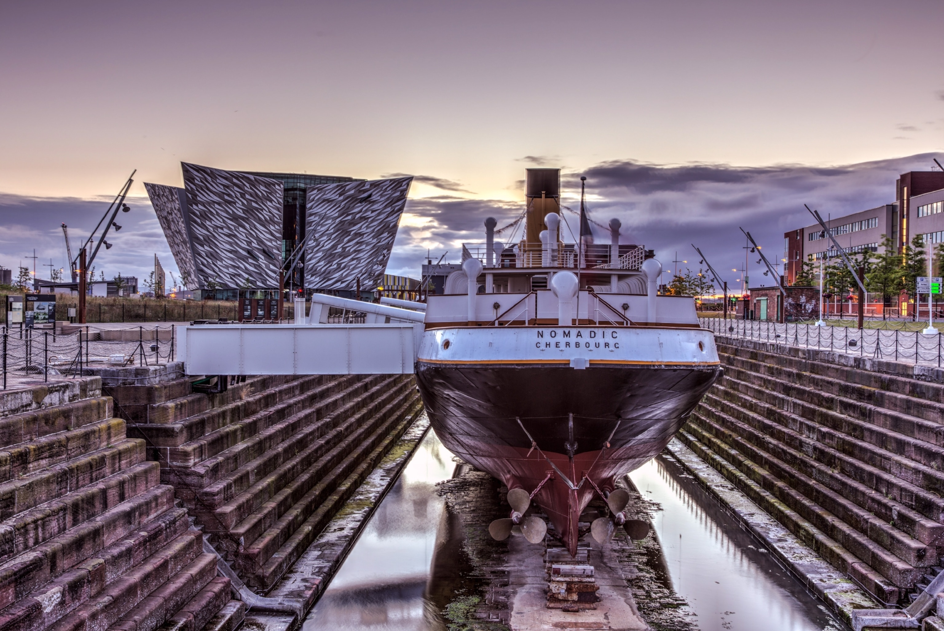 An old boat sits on a dock