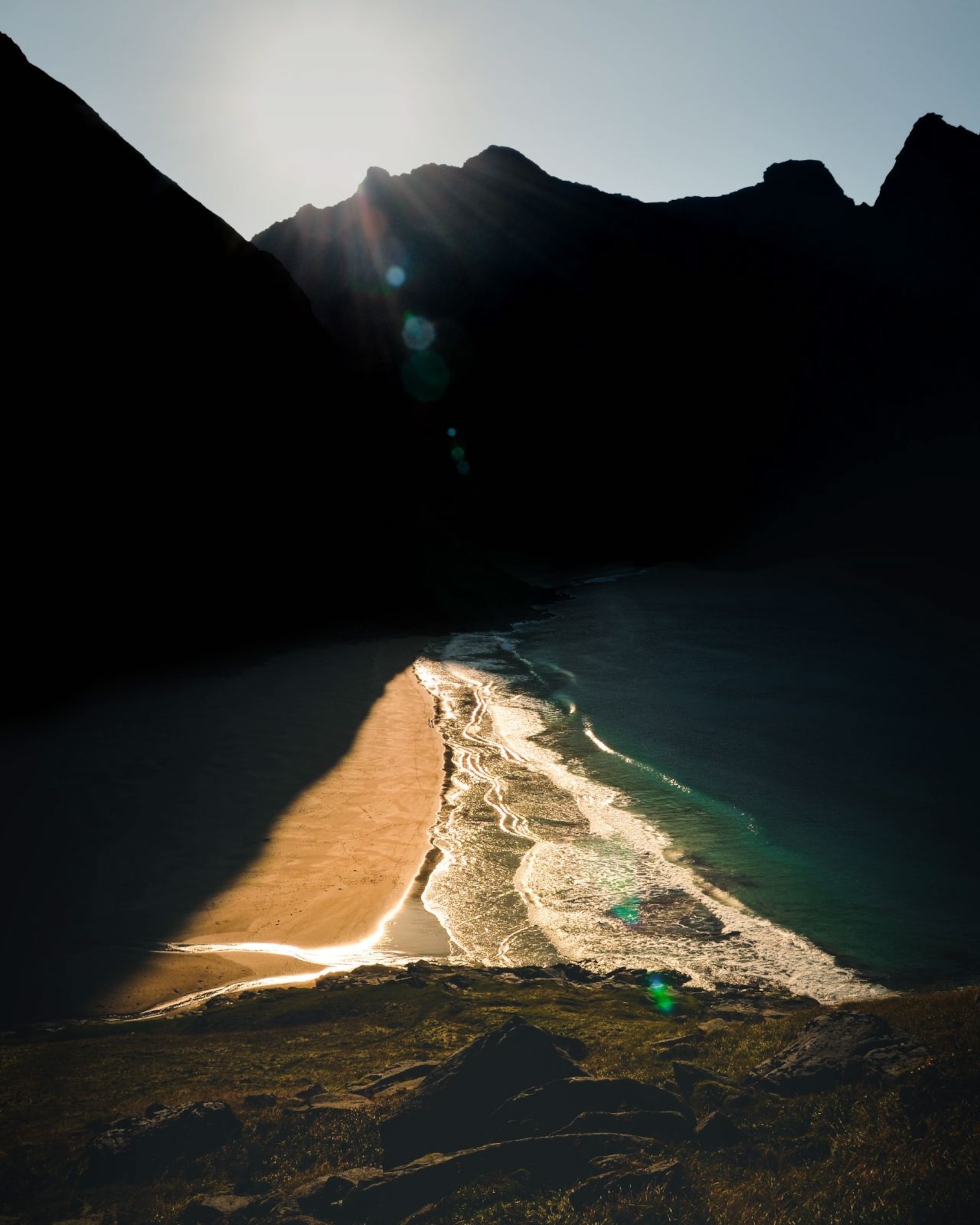 sun striking a beach in the Lofoten Islands, Norway