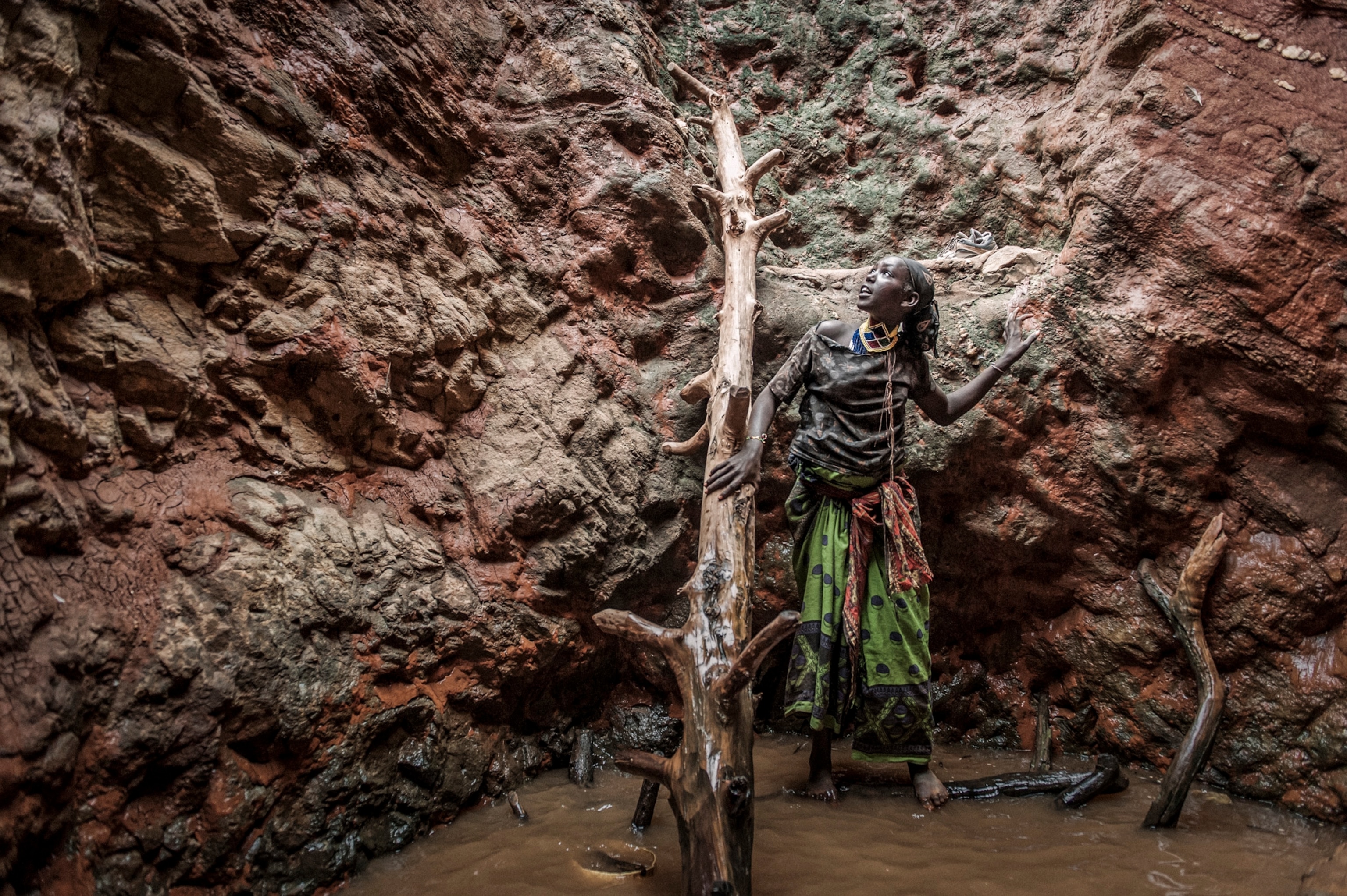 a Borana woman inside a singing well