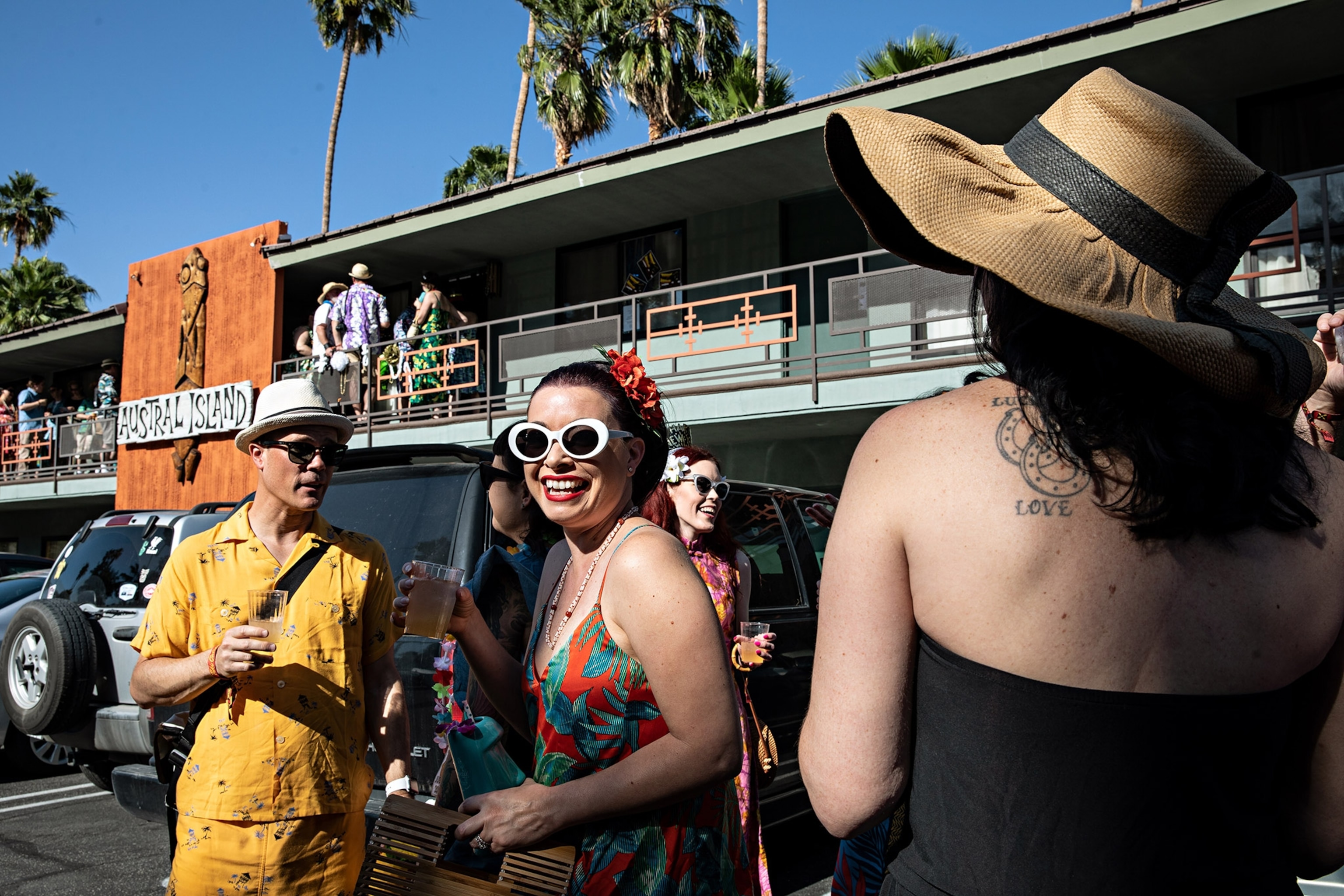 people gathering at the Caliente Tropics Resort in Palm Springs, California