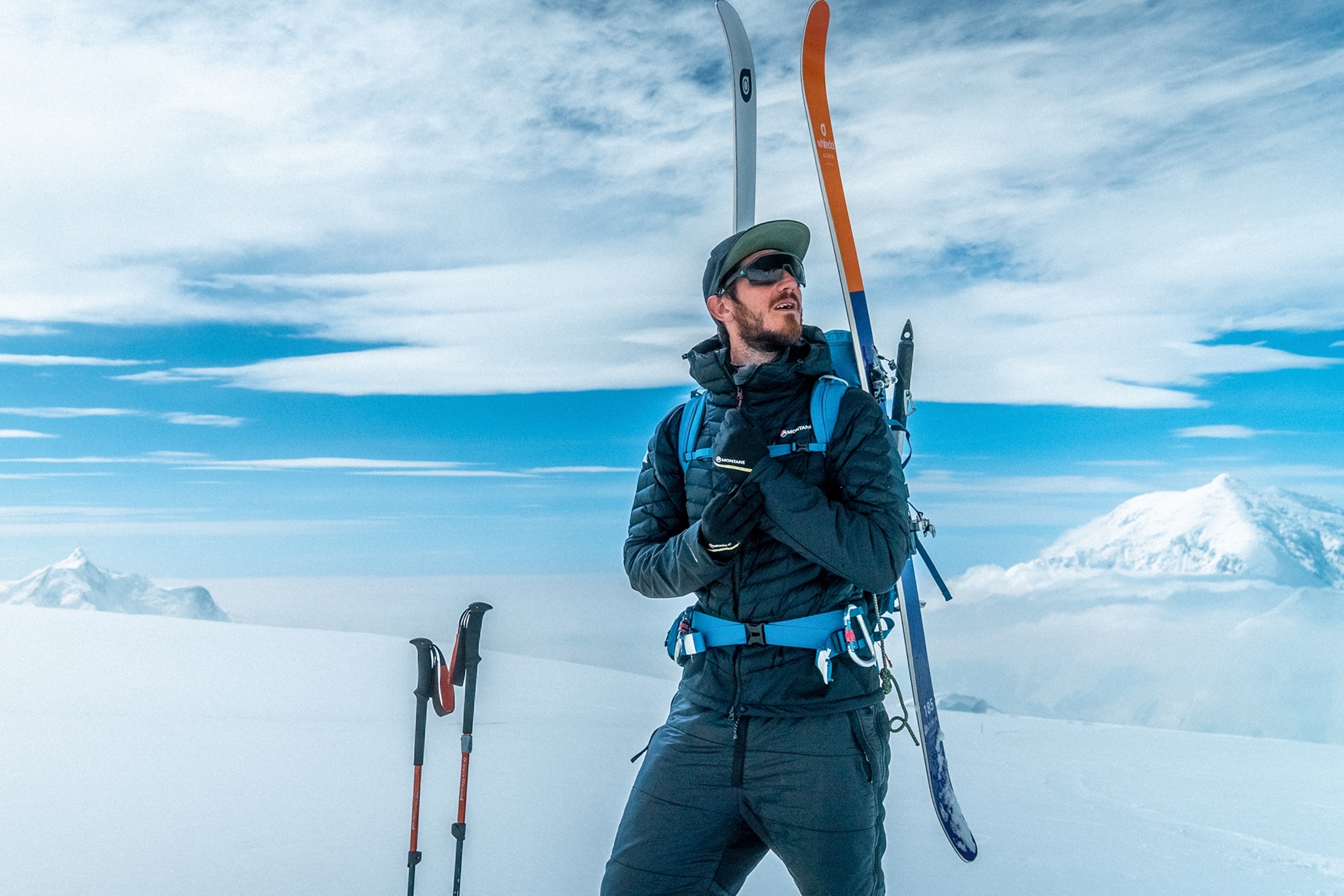 Jon Moy in ski gear and a harness.