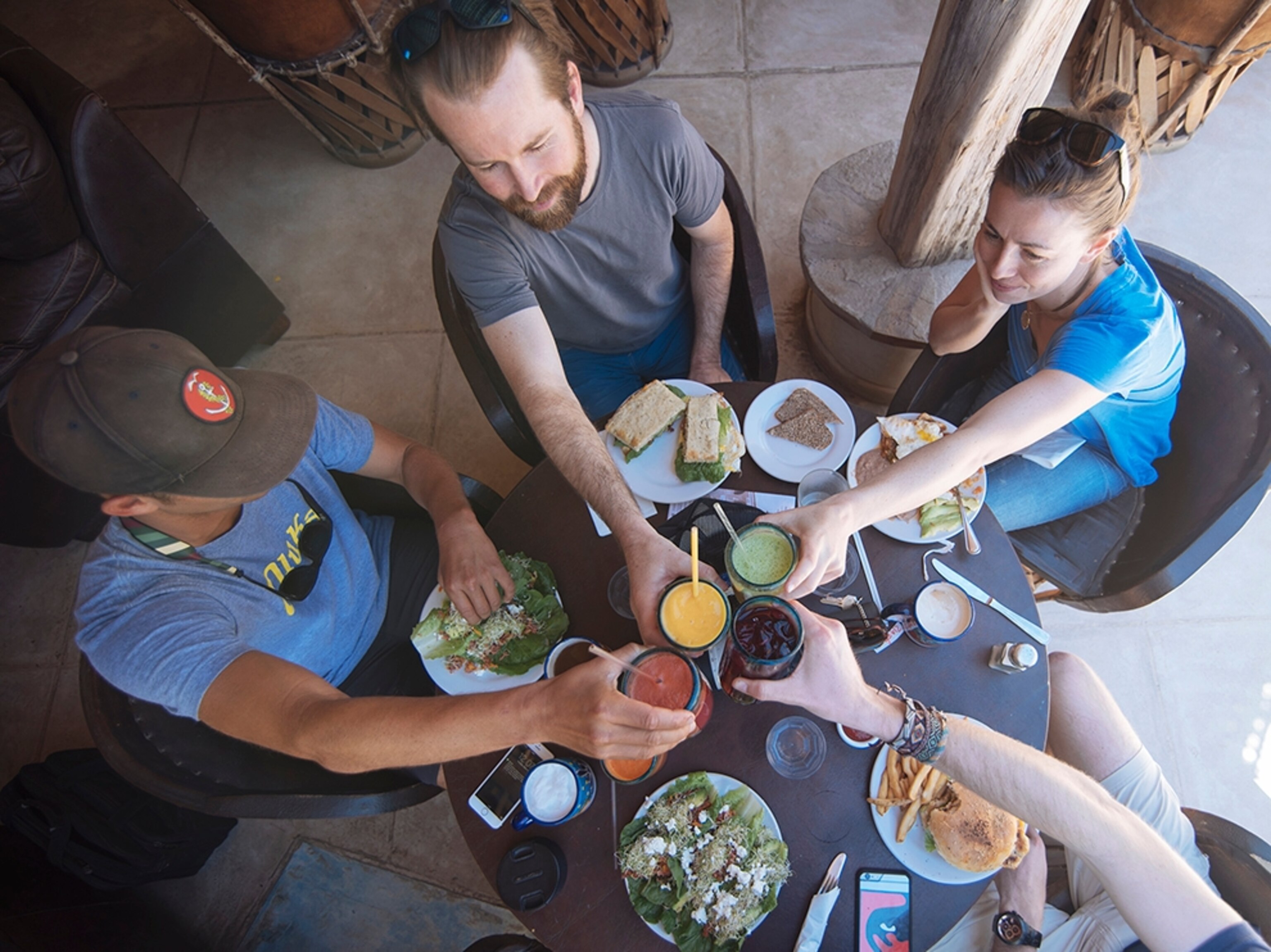 a group of friends raising a glass to good times in Baja, Mexico