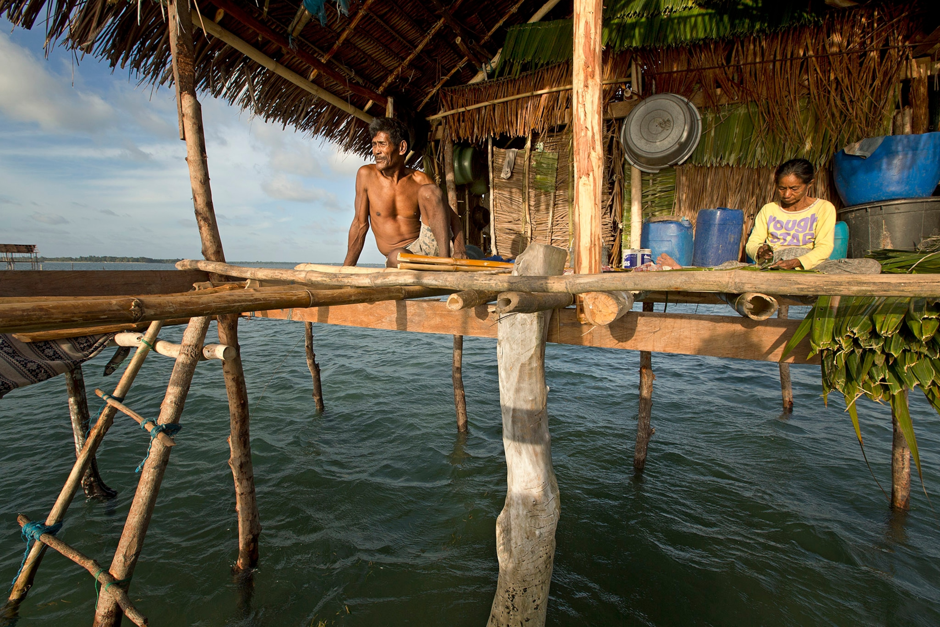 a traditional Bajo home on stilts above the ocean