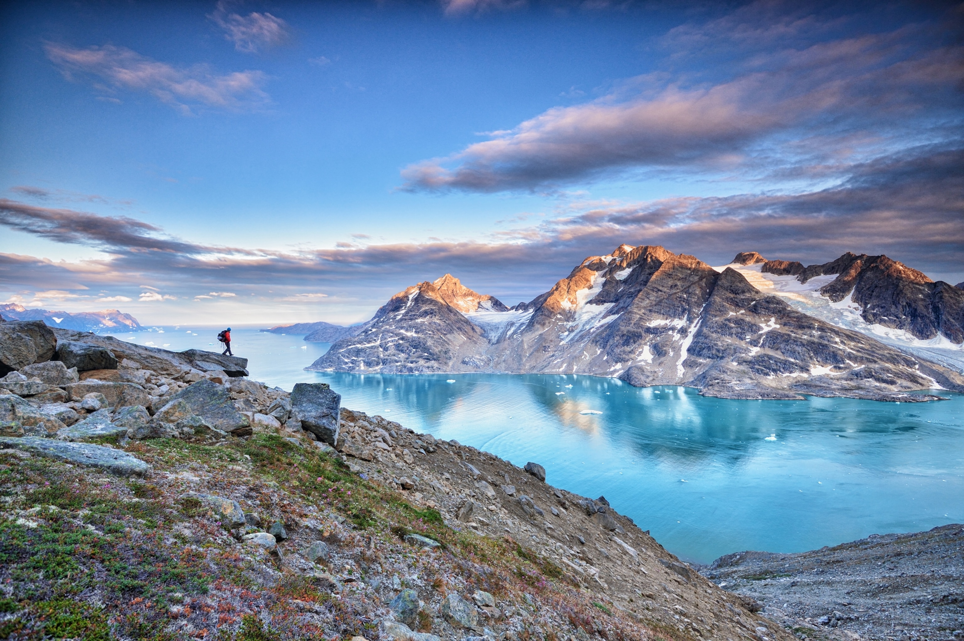 a shore of a remote cirque at sunset Greenland