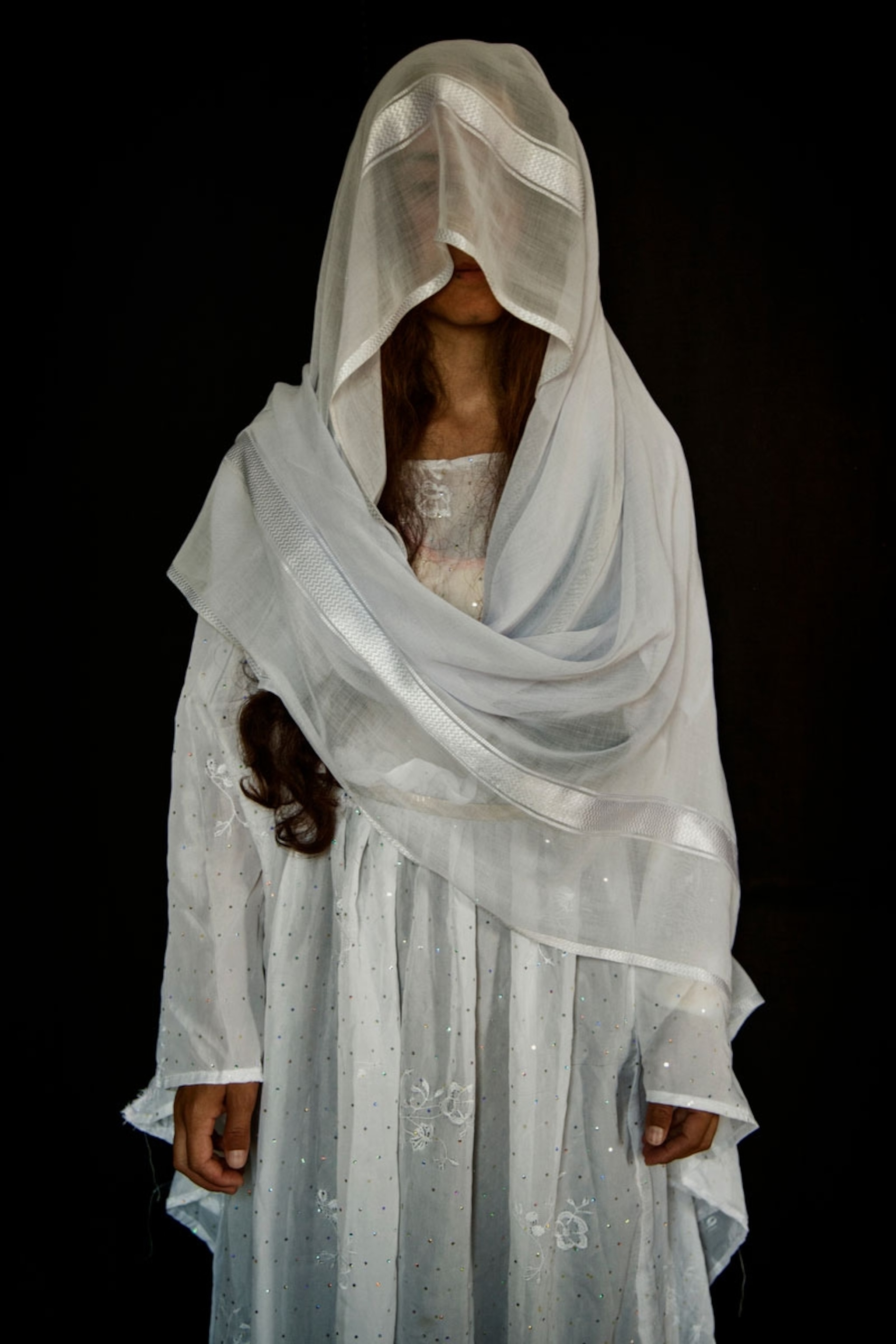 a Yazidi woman who was held as a slave by ISIS