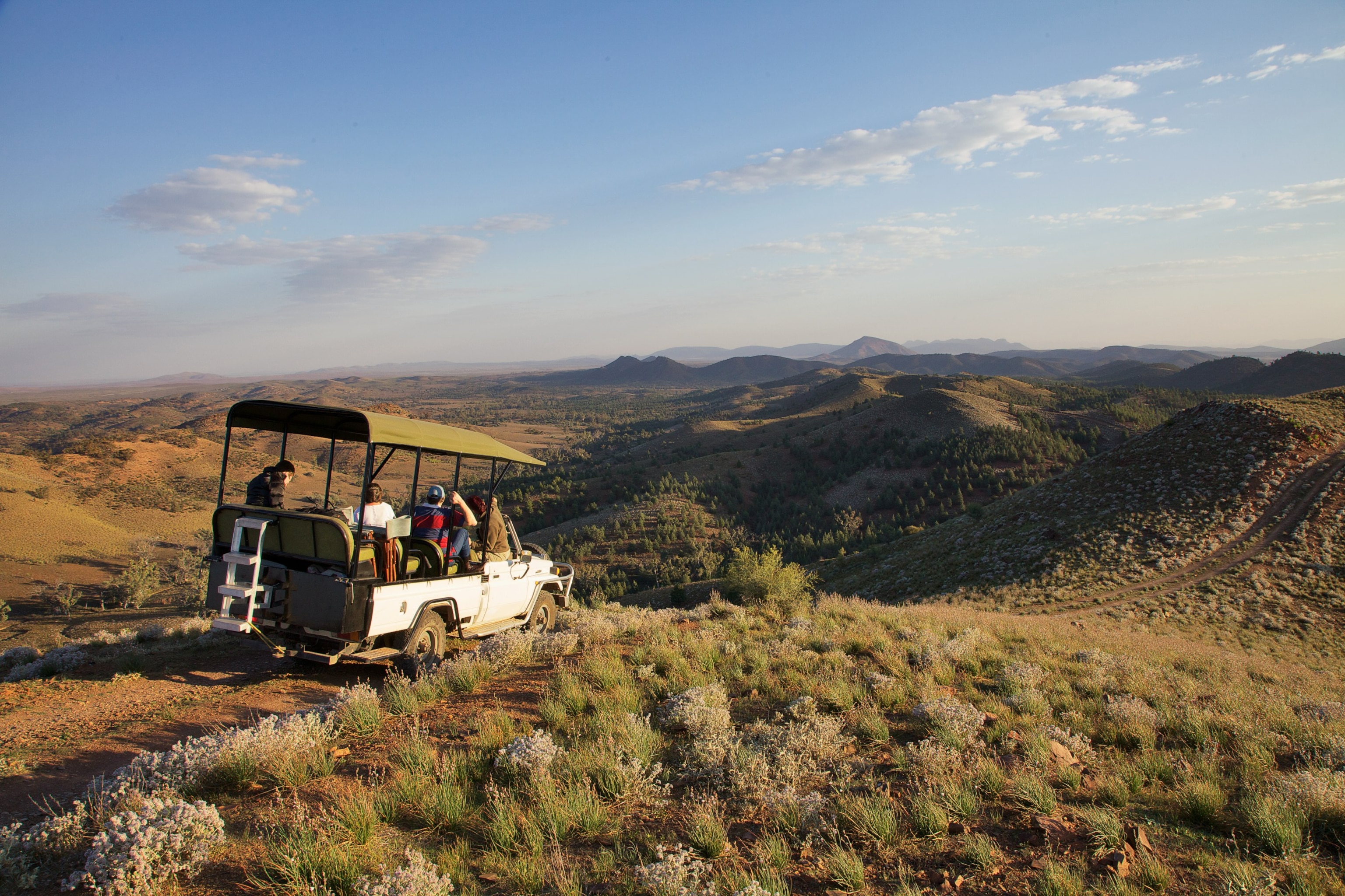 A jeep takes tourists on safari off the beaten track in Flinders Ranges, South Australia.