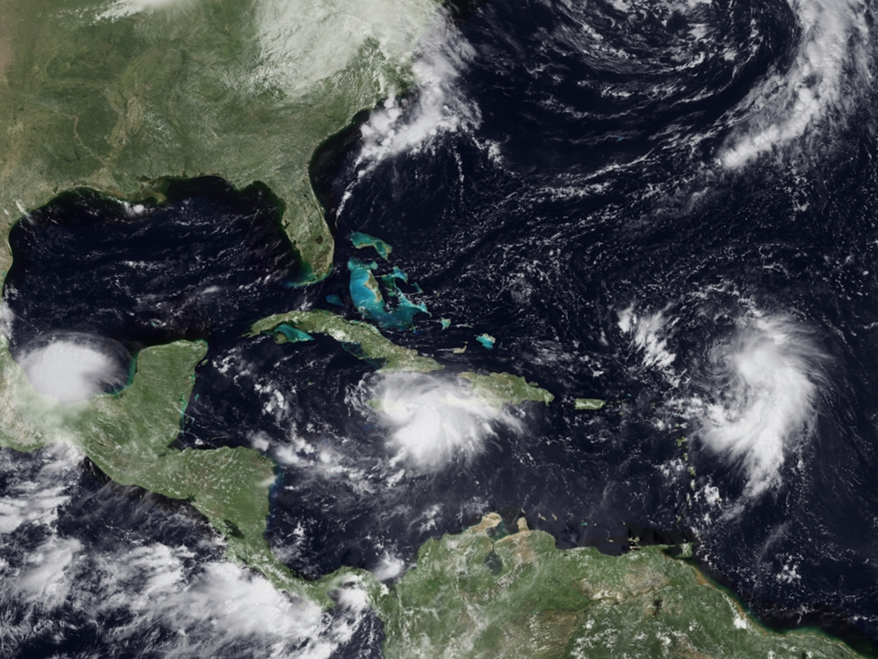 Satellite photo of three storms in the Atlantic and Gulf of Mexico