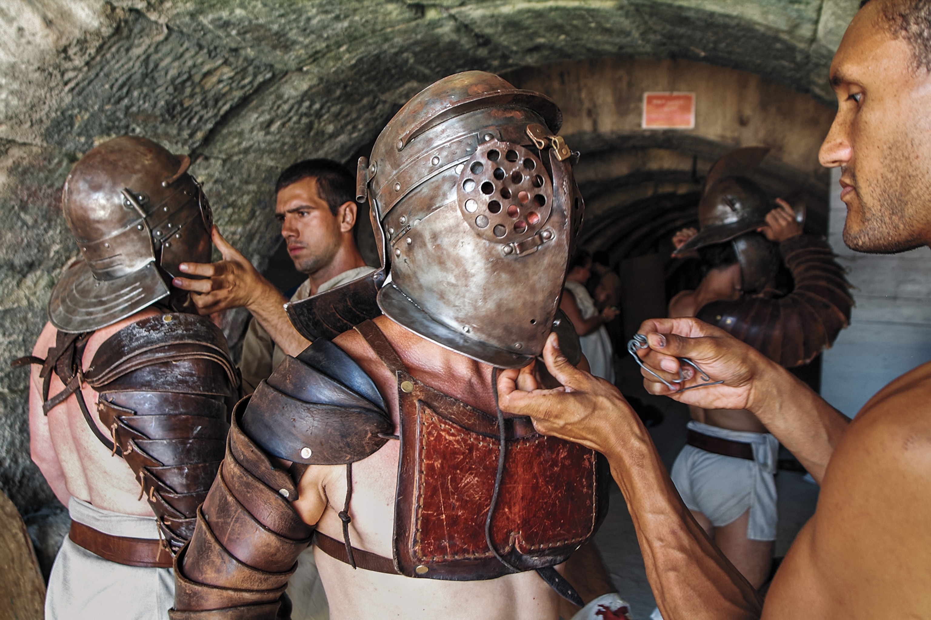 Dressed in the armor of a provocateur, two fighters prepare to do battle in the arena of the Roman-era Arles amphitheater.