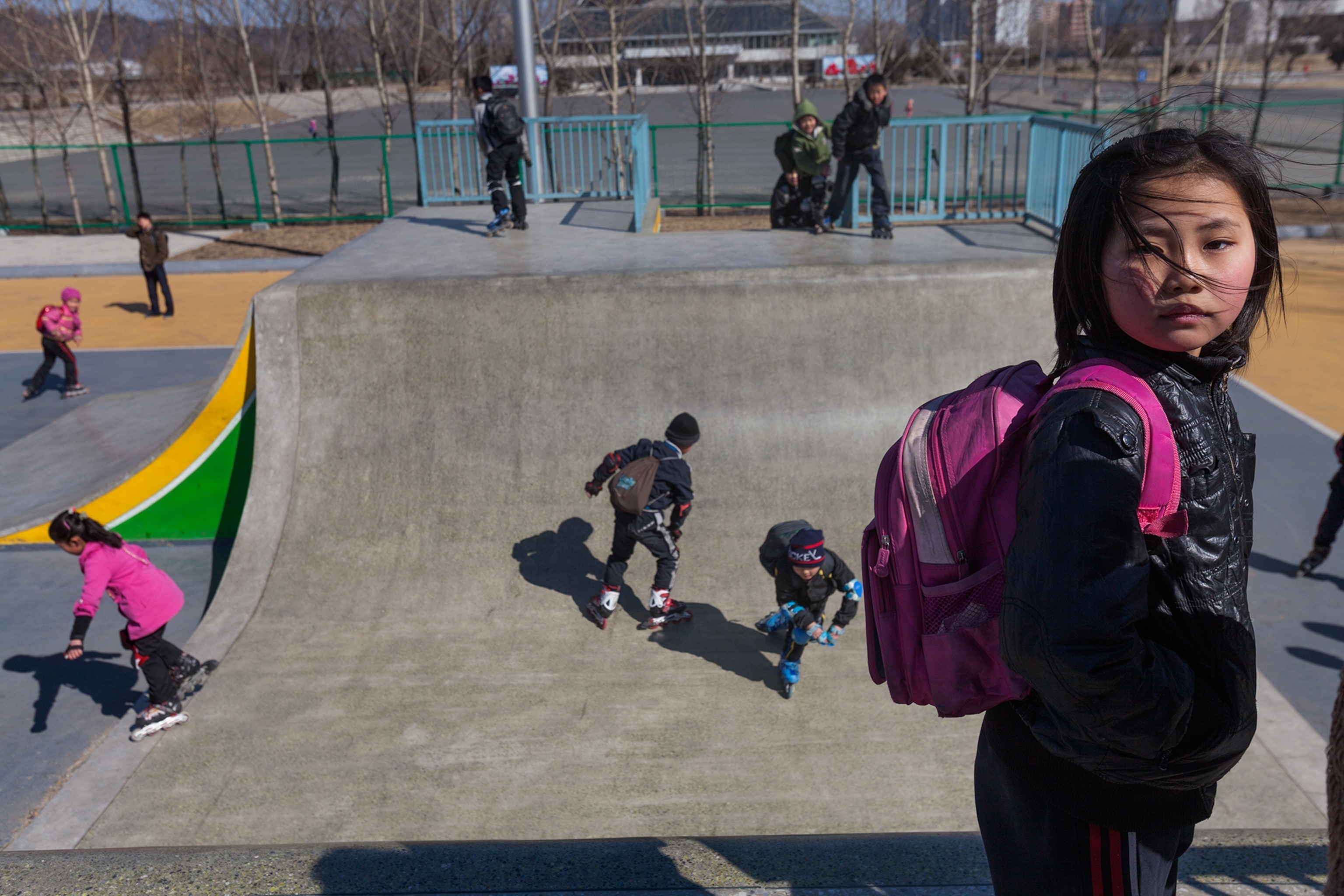 children playing in skate park