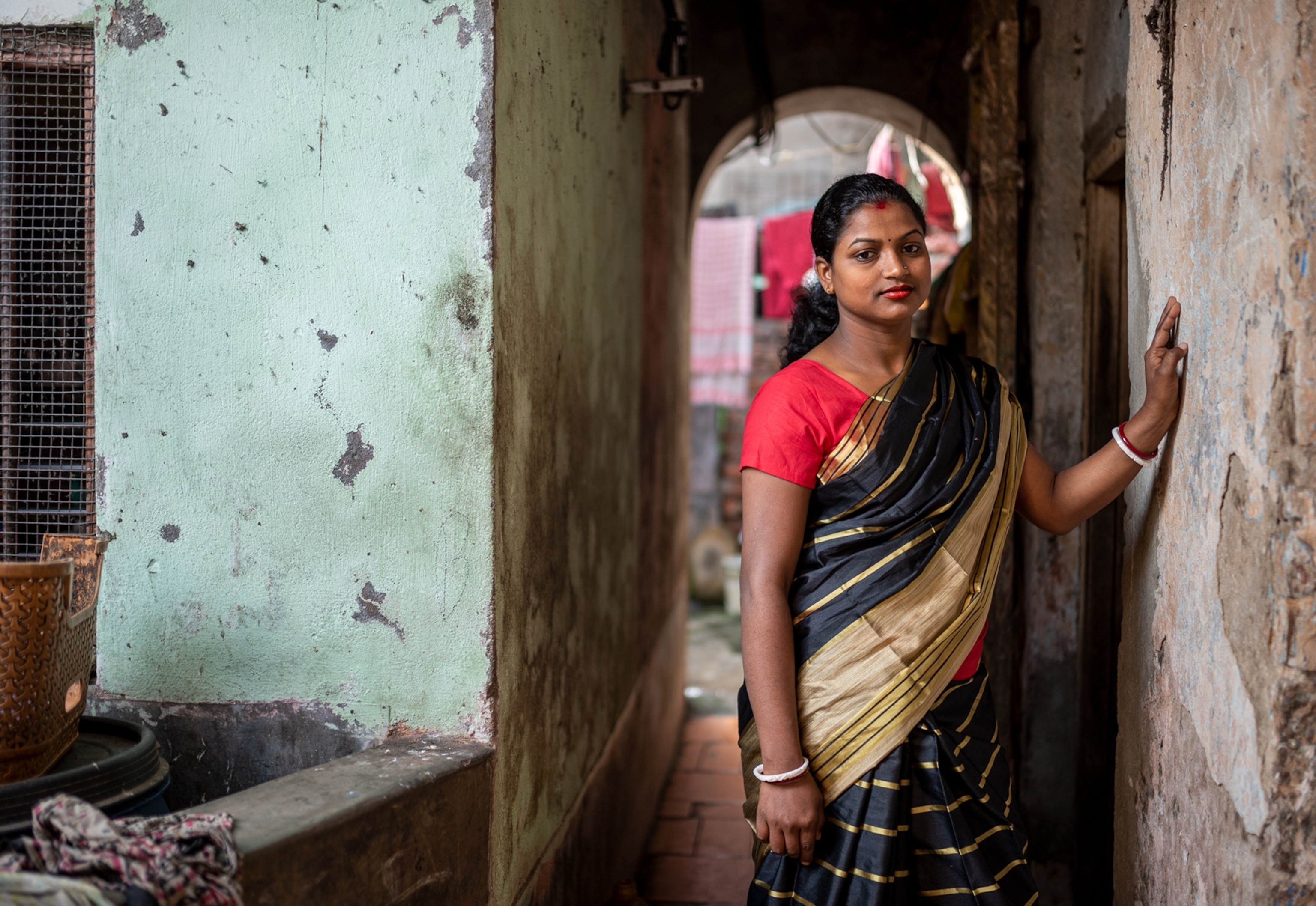 a woman standing in a doorway