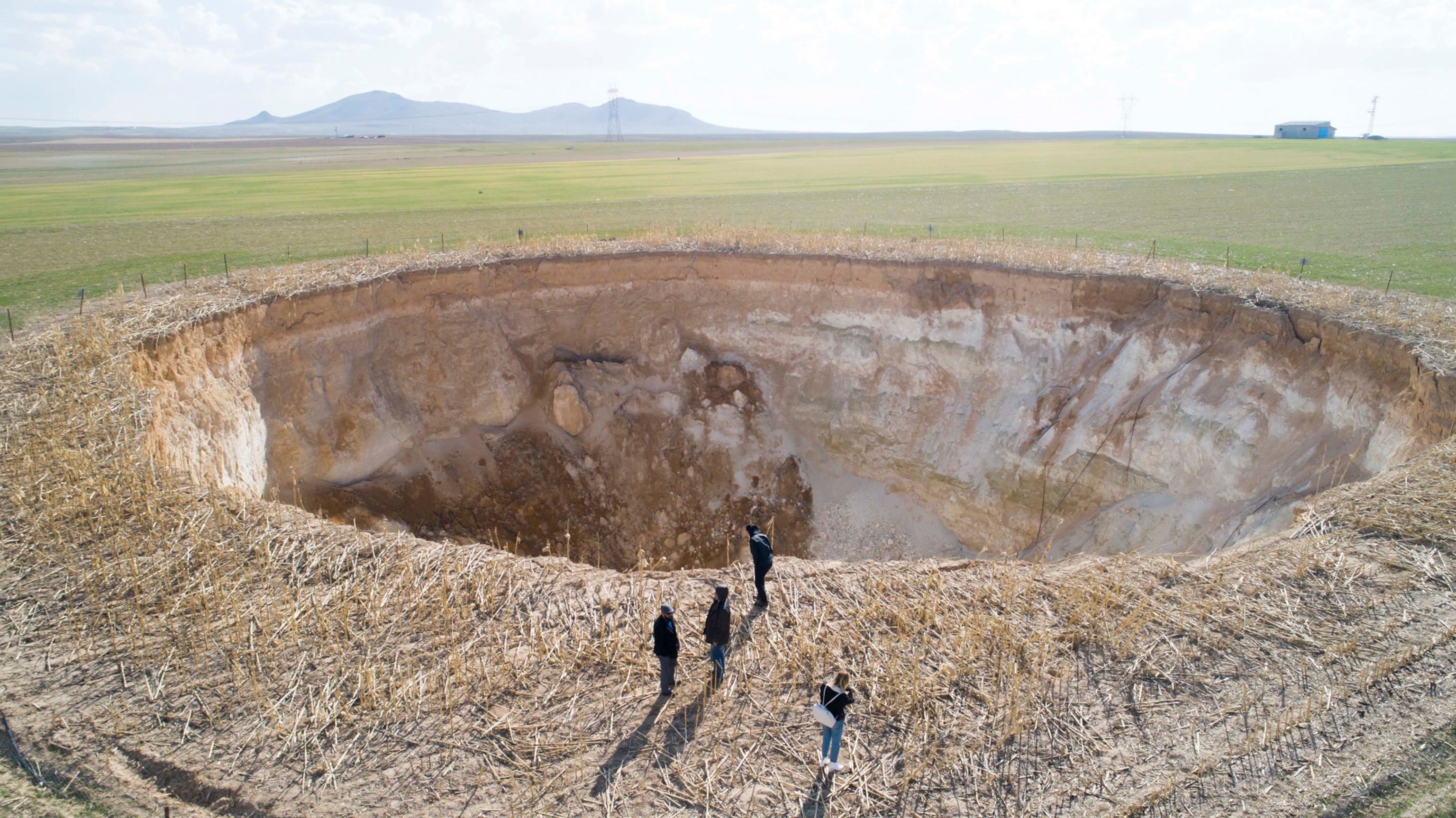 A drone photo shows a giant sinkhole in Karapinar district of Konya, Turkey