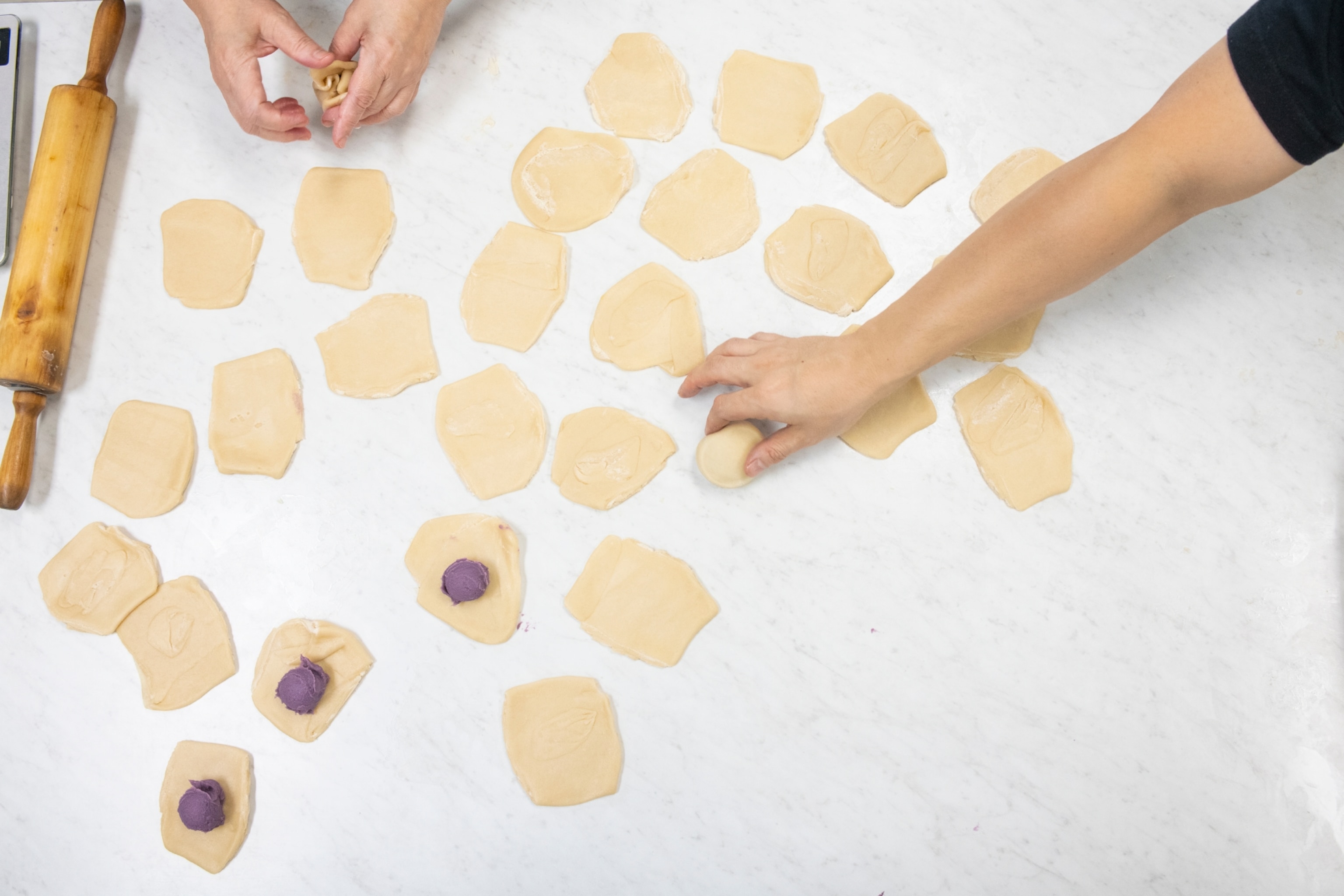 hands creating pastries