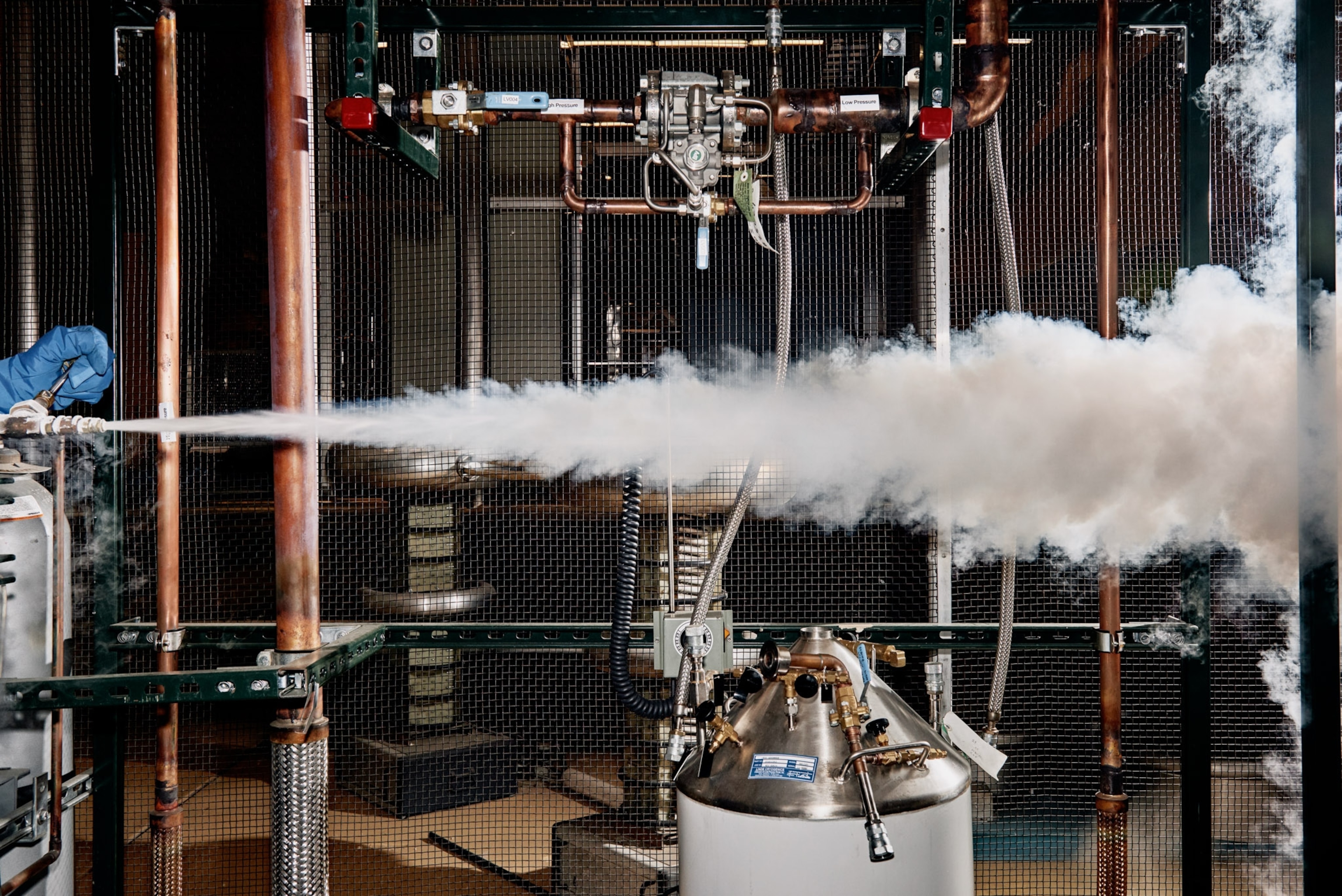 a research engineer doing maintenance with liquid nitrogen in the lab in Seattle=