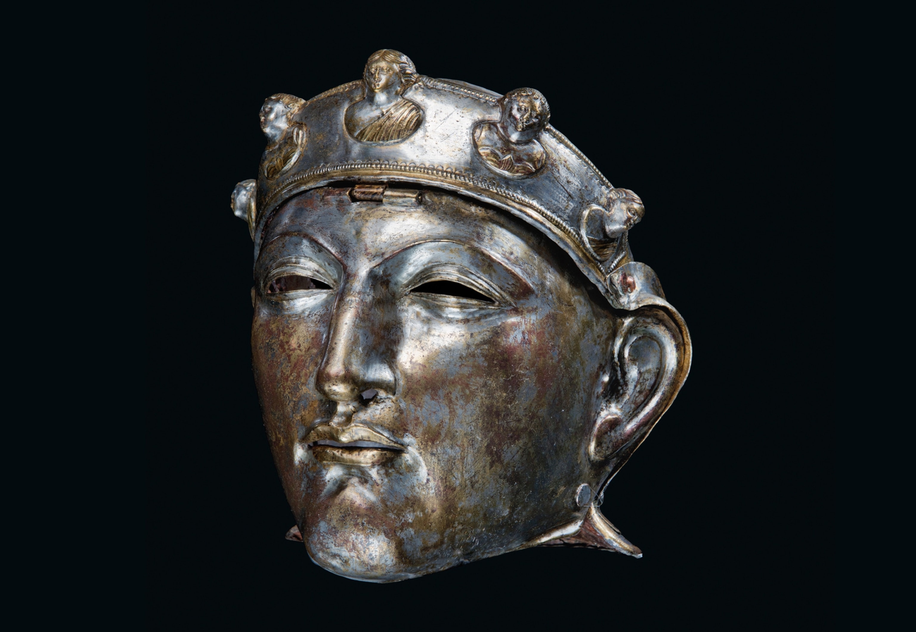 an iron mask worn for parades or perhaps into battle