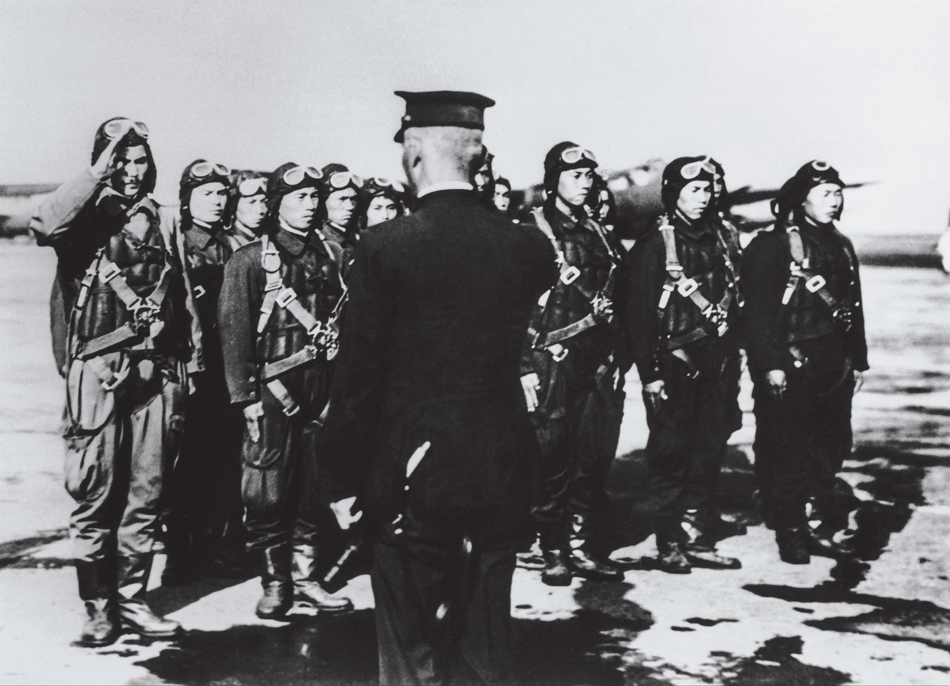 Japanese naval pilots receive orders before bombing Pearl Harbor.